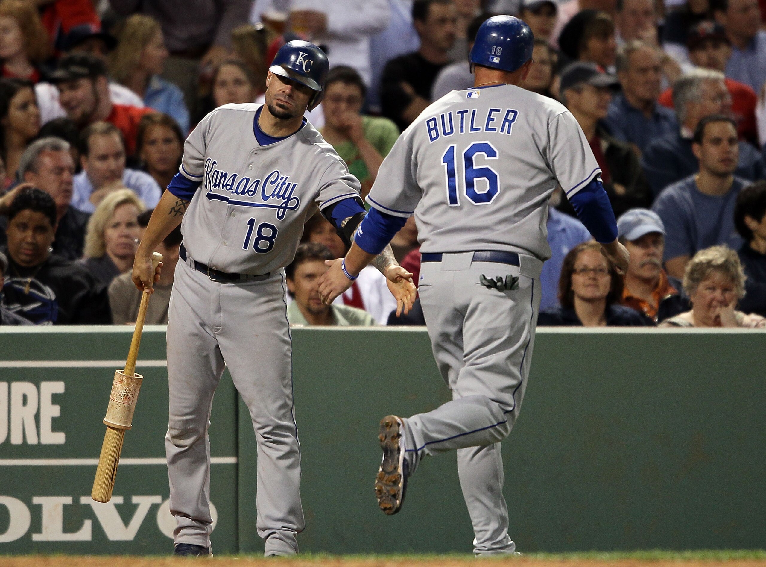 BOSTON - MAY 27:  Jason Kendall #18 of the Kansas City Royals congratulates teammate Billy Butler #16 after he scored in the fifth inning against the Boston Red Sox on May 27, 2010 at Fenway Park in Boston, Massachusetts.  (Photo by Elsa/Getty Images)