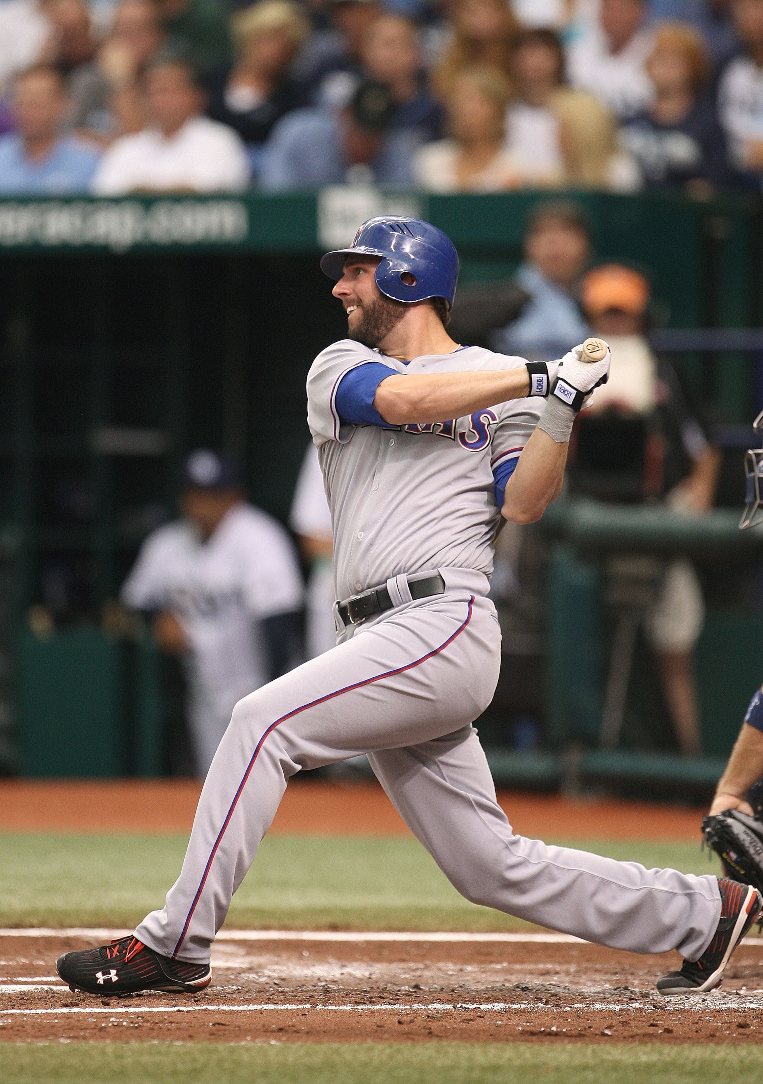 ST PETERSBURG, FL - OCTOBER 06:  6: Jeff Francoeur #21 of the Texas Rangers hits an RBI double in the first inning inning off pitcher David Price during Game 1 of the ALDS against the Tampa Bay Rays at Tropicana Field on October 6, 2010 in St. Petersburg,
