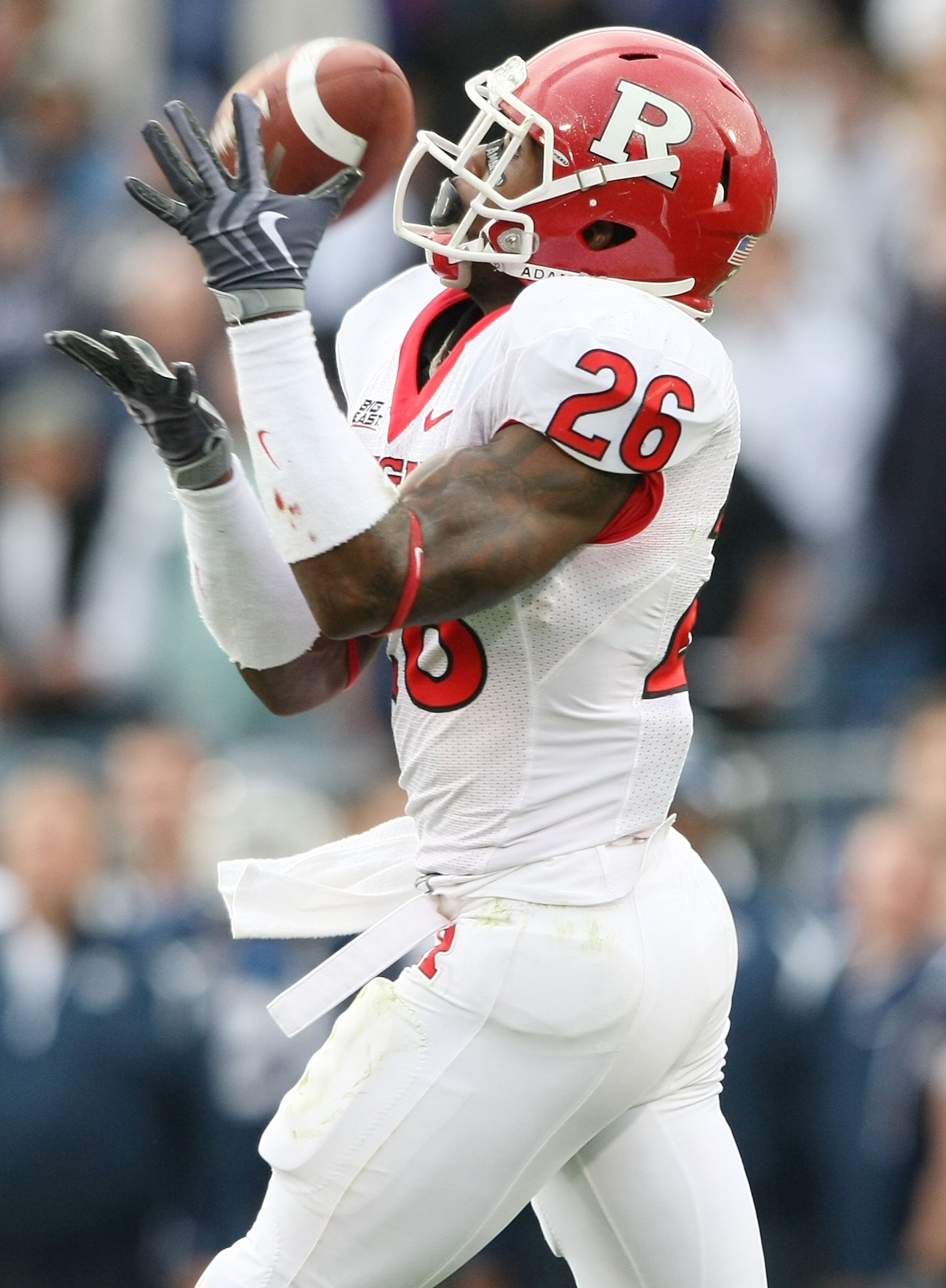 EAST HARTFORD, CT - OCTOBER 31: Joe Lefeged #26 of the Rutgers Scarlet Knights returns a punt in the second half against the Connecticut Huskies on October 31, 2009 at Rentschler Field in East Hartford, Connecticut. Rutgers defeated Connecticut 28-24. ( EAST HARTFORD, CT - OCTOBER 31: Joe Lefeged #26 of the Rutgers Scarlet Knights returns a punt in the second half against the Connecticut Huskies on October 31, 2009 at Rentschler Field in East Hartford, Connecticut. Rutgers defeated Connecticut 28-24. (