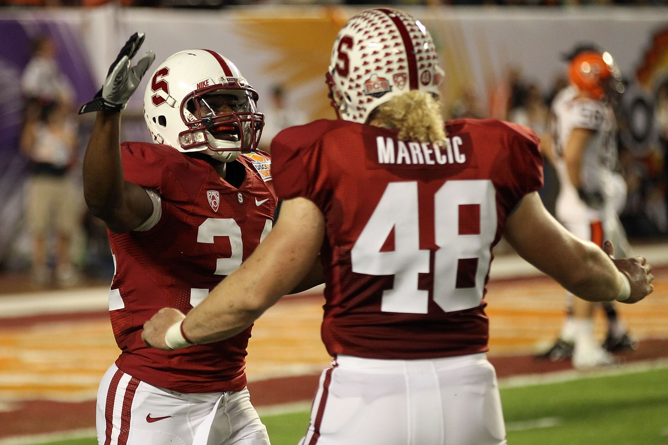 MIAMI, FL - JANUARY 03: (L-R) Jeremy Stewart #34 and Owen Marecic #48 of the Stanford Cardinal celebrate after Stewart scored a 60-yard rushing touchdown in the first quarter against the Virginai Tech Hokies during the 2011 Discover Orange Bowl at Sun Li MIAMI, FL - JANUARY 03: (L-R) Jeremy Stewart #34 and Owen Marecic #48 of the Stanford Cardinal celebrate after Stewart scored a 60-yard rushing touchdown in the first quarter against the Virginai Tech Hokies during the 2011 Discover Orange Bowl at Sun Li