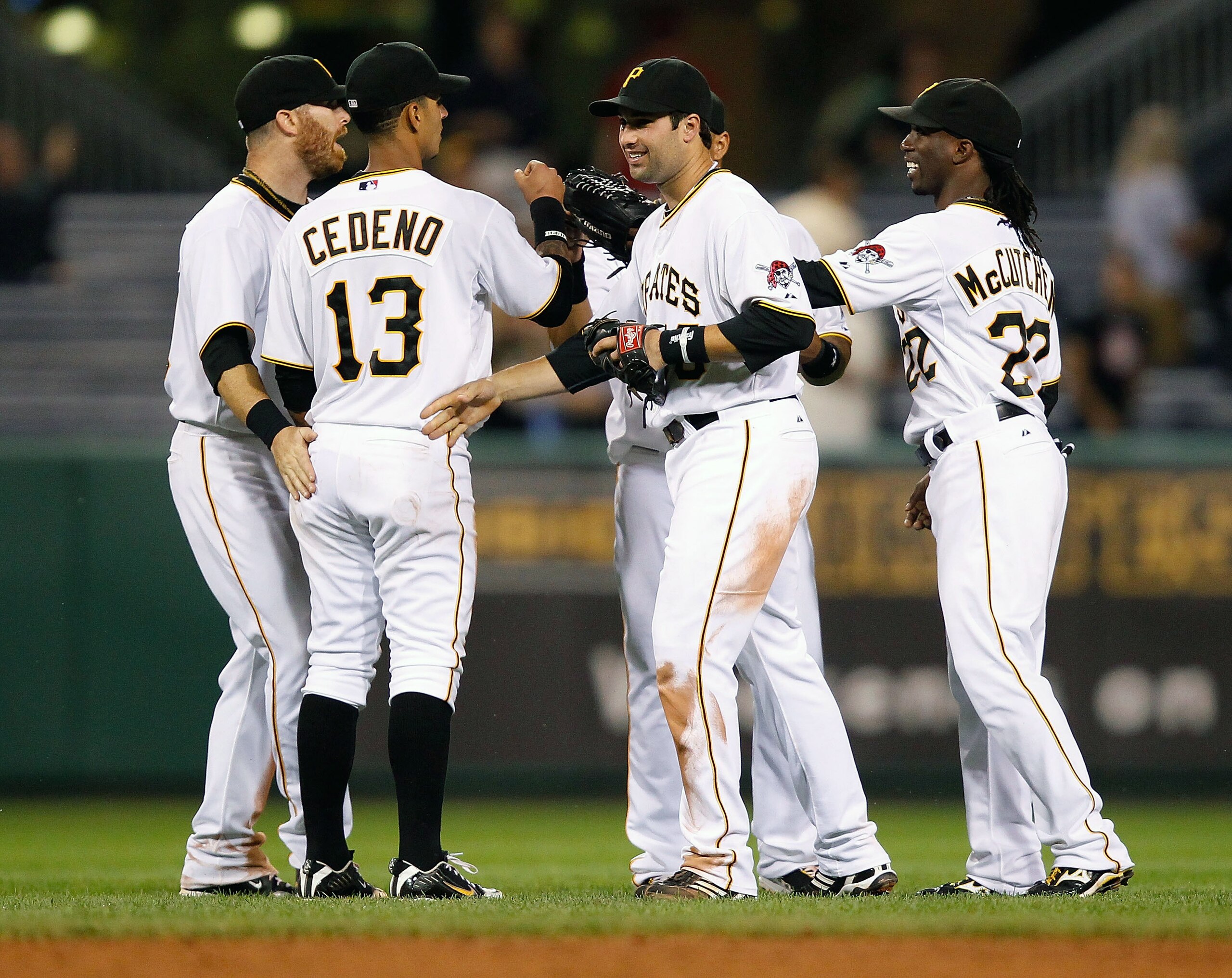 PITTSBURGH - AUGUST 25: Ronny Cedeno #13, Neil Walker #18, Andrew McCutchen #22, Ryan Doumit #41, and Jose Tabata #31 of the Pittsburgh Pirates congratulate each other after their win against the St. Louis Cardinals during the game on August 25, 2010 at PITTSBURGH - AUGUST 25: Ronny Cedeno #13, Neil Walker #18, Andrew McCutchen #22, Ryan Doumit #41, and Jose Tabata #31 of the Pittsburgh Pirates congratulate each other after their win against the St. Louis Cardinals during the game on August 25, 2010 at