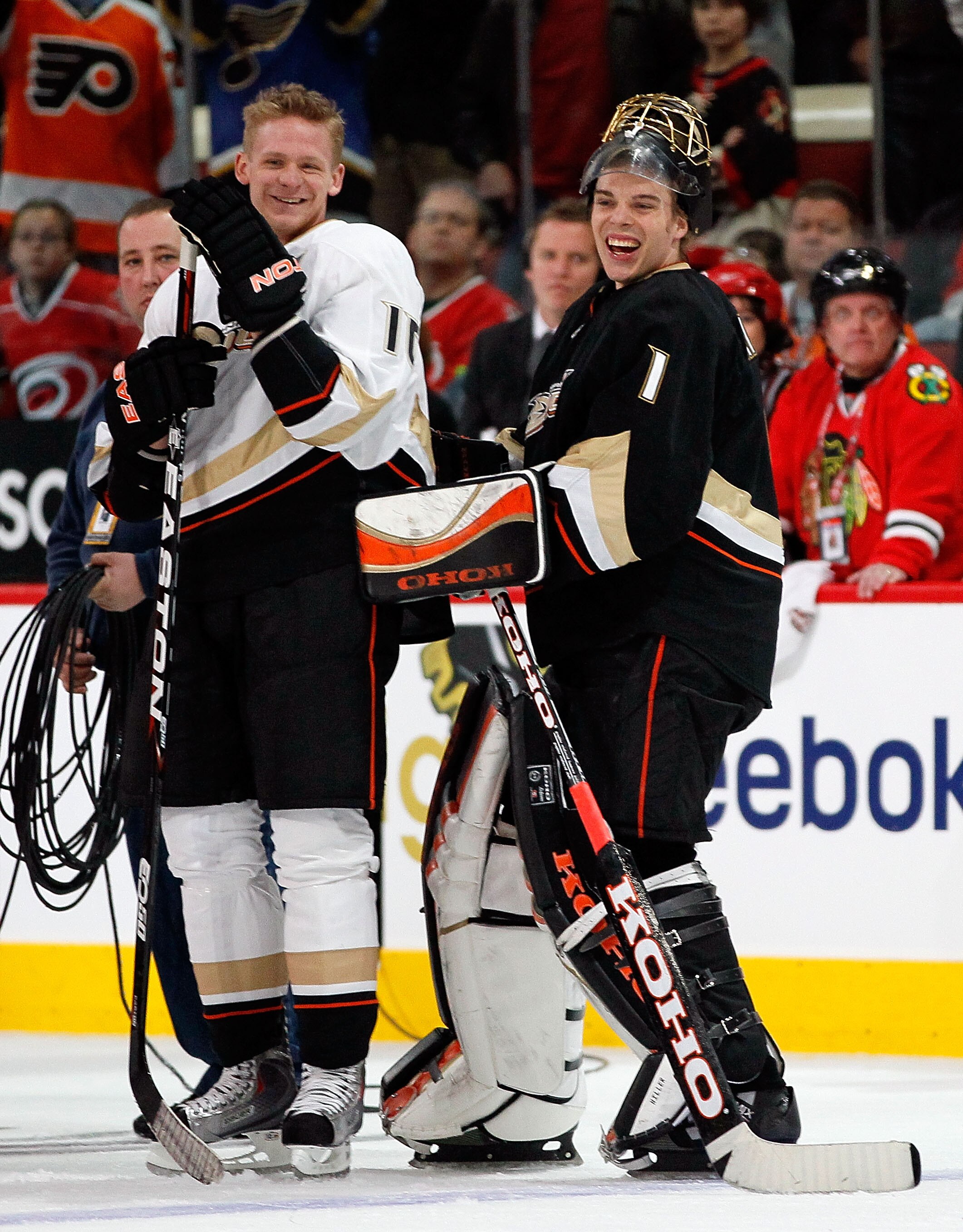 RALEIGH, NC - JANUARY 29:  Corey Perry #10 and Jonas Hiller #1 of the Anaheim Ducks smile during the Honda NHL SuperSkills competition part of 2011 NHL All-Star Weekend at the RBC Center on January 29, 2011 in Raleigh, North Carolina.  (Photo by Kevin C.