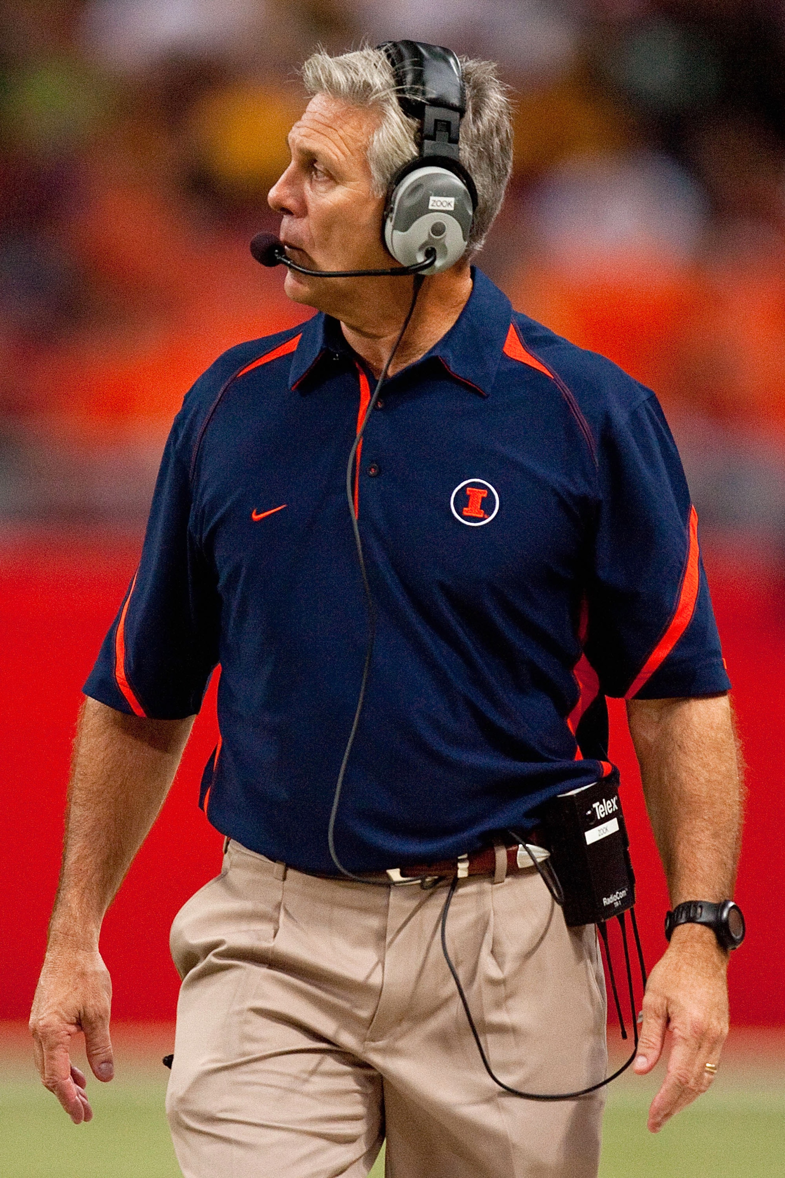ST. LOUIS - SEPTEMBER 4: Head coach Ron Zook of the University of Illinois Fighting Illini looks on from the sideline against the University of Missouri Tigers during the State Farm Arch Rivalry game on September 4, 2010 at the Edward Jones Dome in St. Lo ST. LOUIS - SEPTEMBER 4: Head coach Ron Zook of the University of Illinois Fighting Illini looks on from the sideline against the University of Missouri Tigers during the State Farm Arch Rivalry game on September 4, 2010 at the Edward Jones Dome in St. Lo