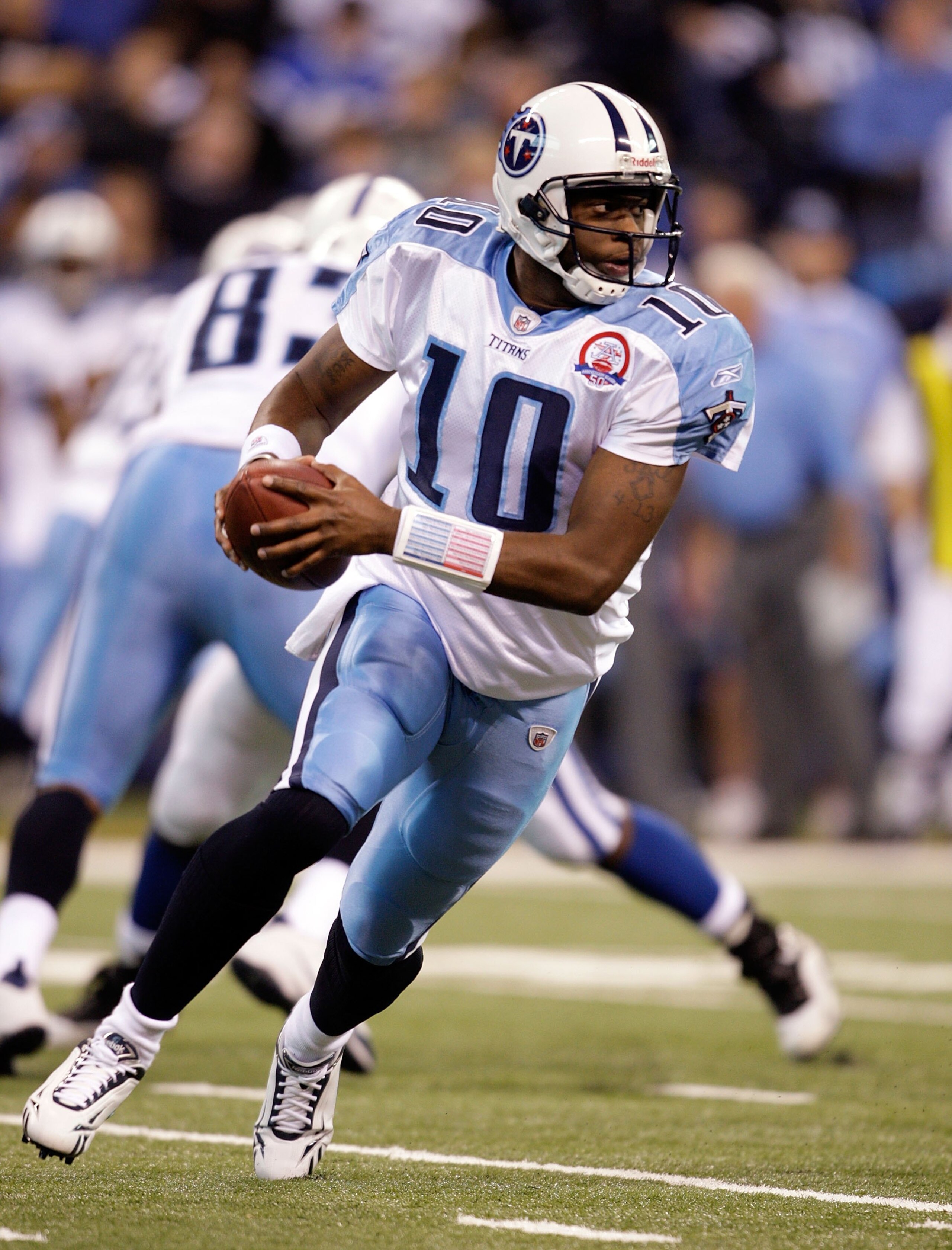 INDIANAPOLIS - DECEMBER 06:  Vince Young #10 of  the Tennessee Titans runs with the ball during the NFL game against the Indianapolis Colts at Lucas Oil Stadium on December 6, 2009 in Indianapolis, Indiana.  (Photo by Andy Lyons/Getty Images)