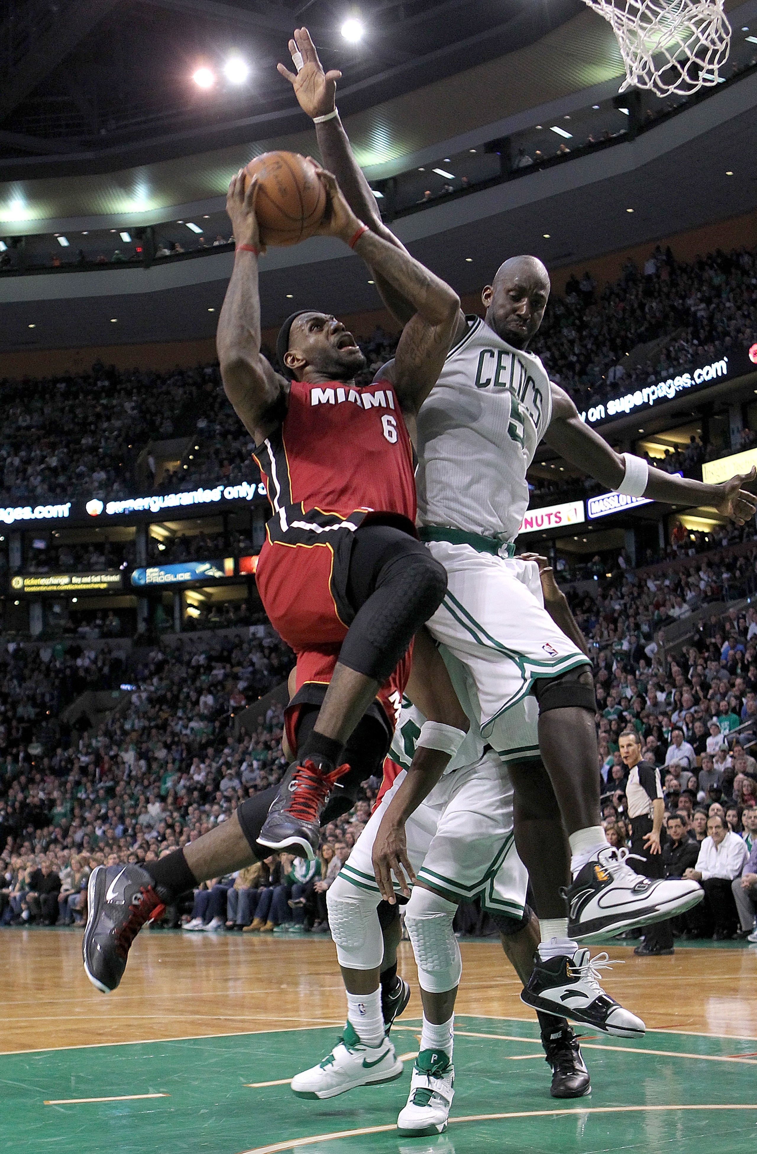 BOSTON - FEBRUARY 13: LeBron James #6 of the Miami Heat drives against Kevin Garnett #5 of the Boston Celtics at TD Garden on February 13, 2011 in Boston, Massachusetts. NOTE TO USER: User expressly acknowledges and agrees that, by downloading and/or us BOSTON - FEBRUARY 13: LeBron James #6 of the Miami Heat drives against Kevin Garnett #5 of the Boston Celtics at TD Garden on February 13, 2011 in Boston, Massachusetts. NOTE TO USER: User expressly acknowledges and agrees that, by downloading and/or us
