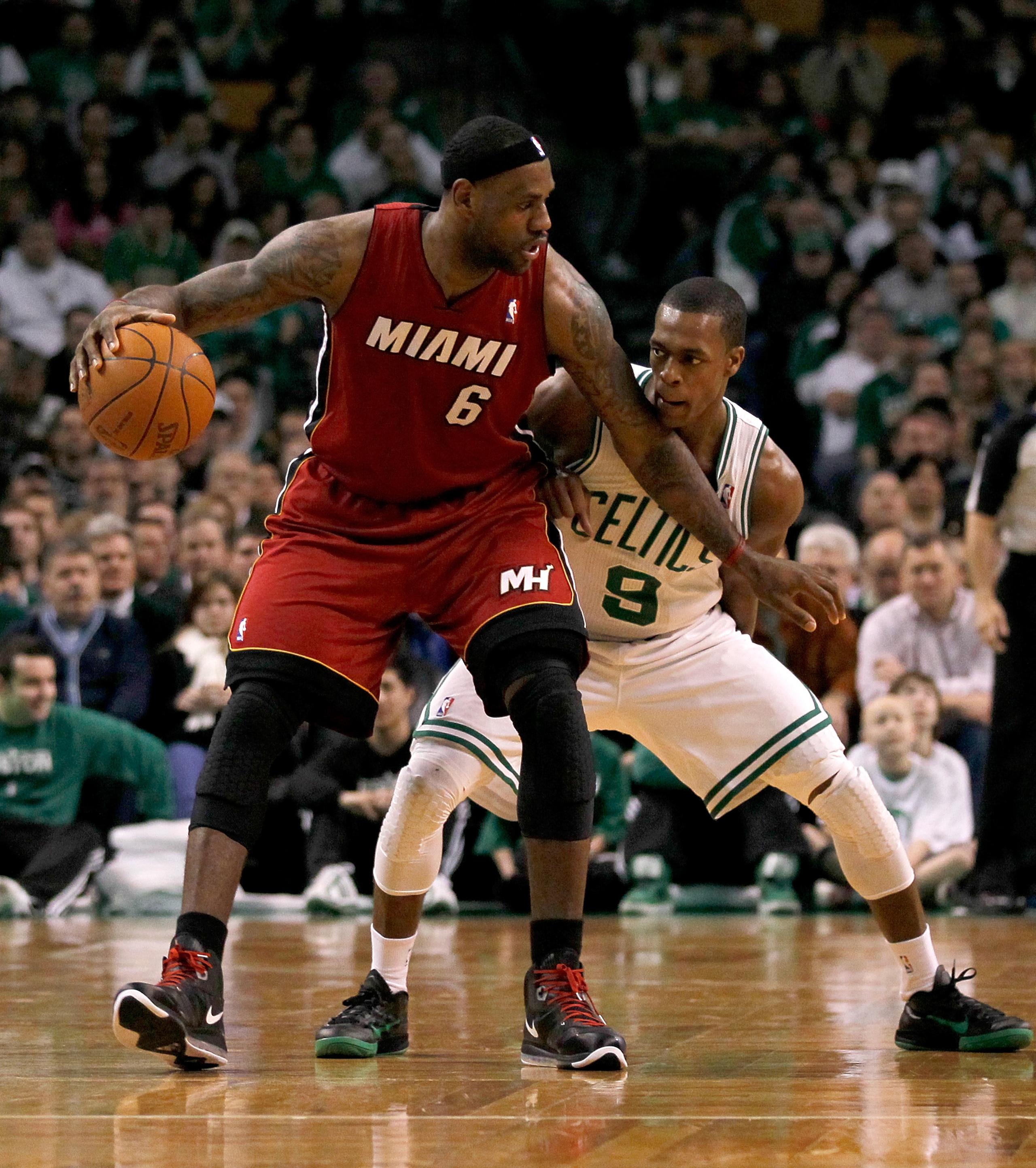 BOSTON - FEBRUARY 13: LeBron James #6 of the Miami Heat battles Rajon Rondo #9 of the Boston Celtics ffor control of the ball at TD Garden on February 13, 2011 in Boston, Massachusetts. NOTE TO USER: User expressly acknowledges and agrees that, by downlo BOSTON - FEBRUARY 13: LeBron James #6 of the Miami Heat battles Rajon Rondo #9 of the Boston Celtics ffor control of the ball at TD Garden on February 13, 2011 in Boston, Massachusetts. NOTE TO USER: User expressly acknowledges and agrees that, by downlo