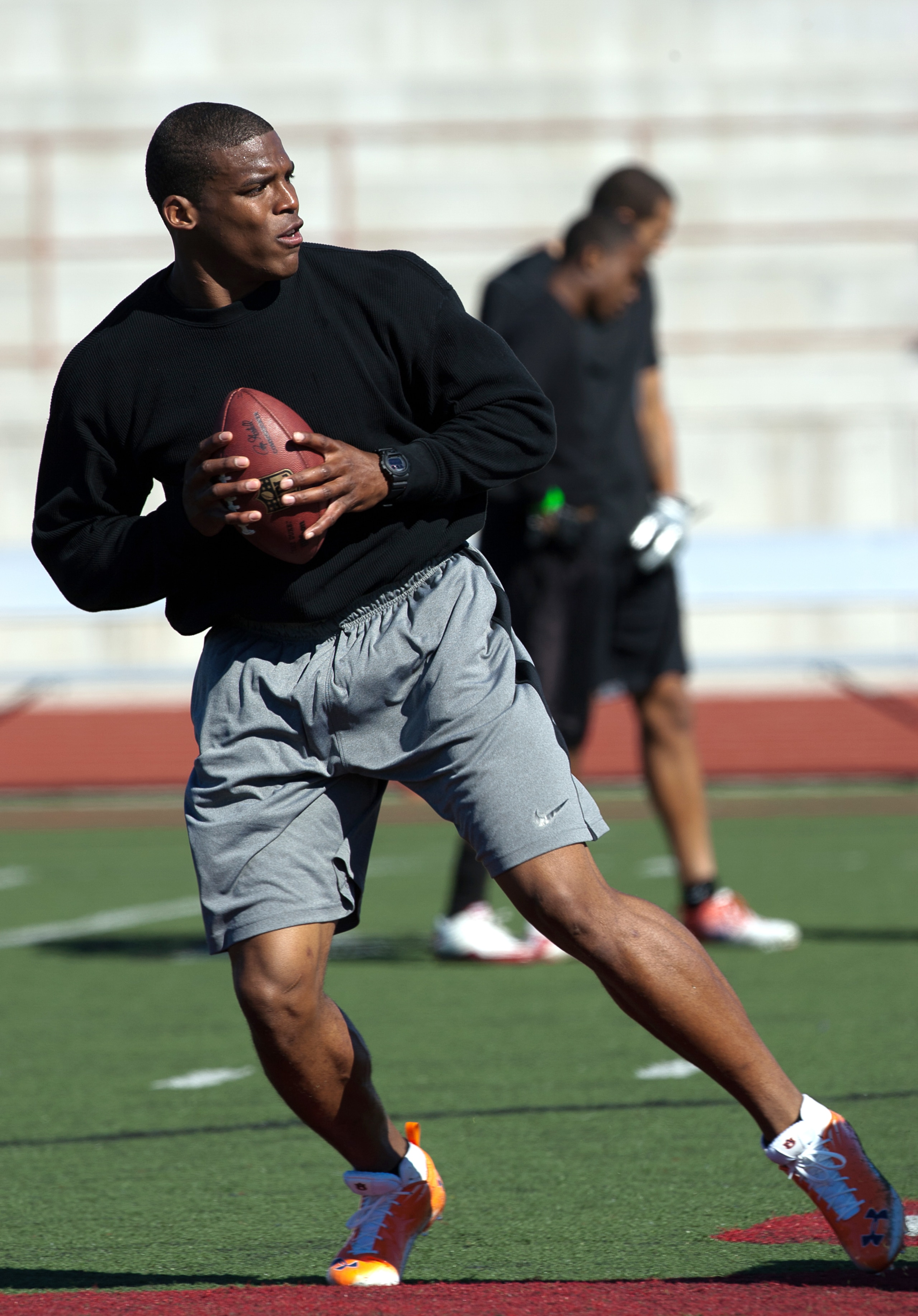 SAN DIEGO, CA - FEBRUARY 10: 2010 Heisman Trophy winning quarterback Cam Newton of the Auburn Tigers goes through his workout routine for the media at Cathedral High School's sports stadium on February 10, 2011 in San Diego, California. (Photo by Kent H SAN DIEGO, CA - FEBRUARY 10: 2010 Heisman Trophy winning quarterback Cam Newton of the Auburn Tigers goes through his workout routine for the media at Cathedral High School's sports stadium on February 10, 2011 in San Diego, California. (Photo by Kent H