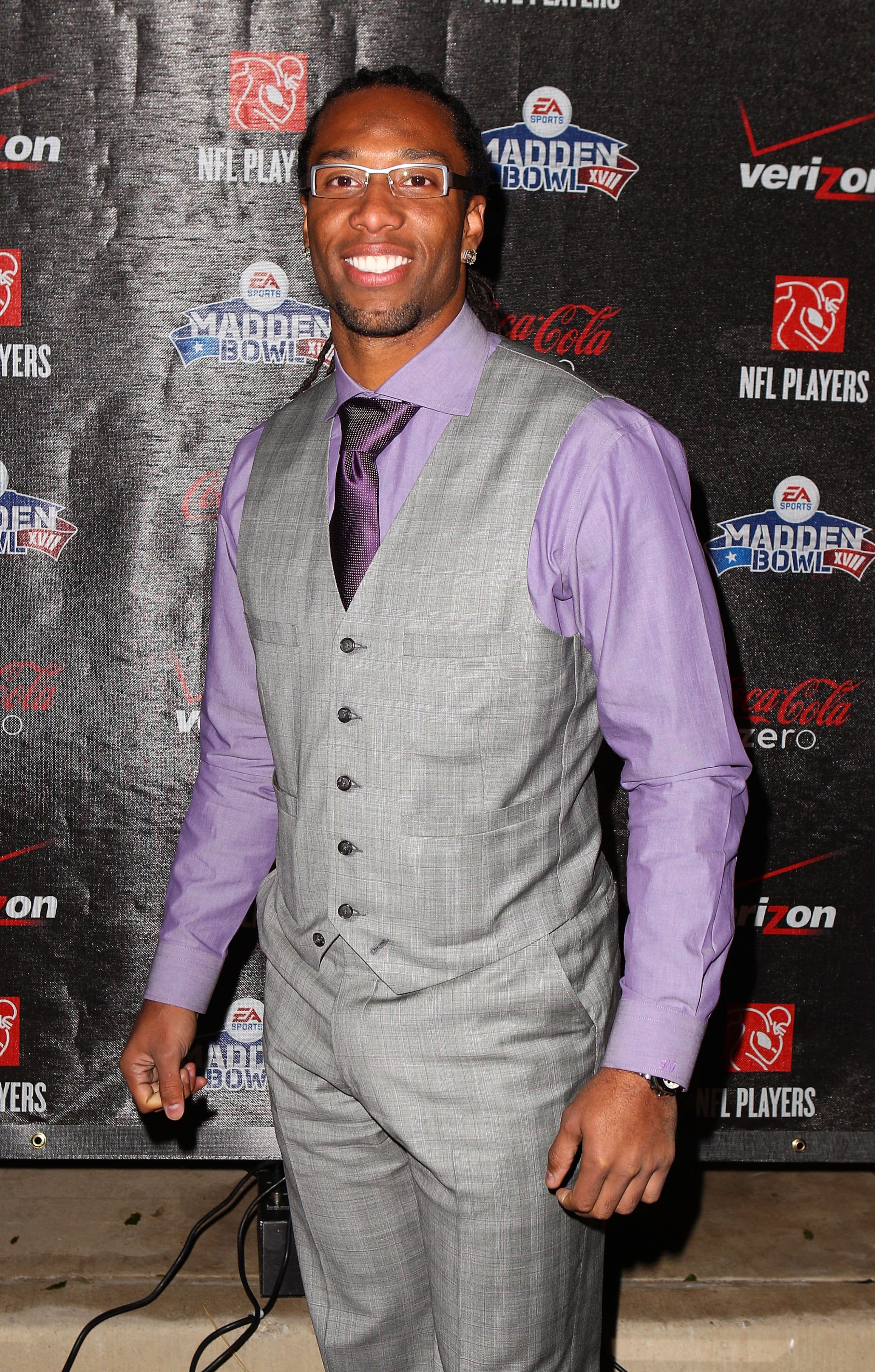GRAPEVINE, TX - FEBRUARY 03:  NFL player Larry Fitzgerald of the Arizona Cardinals attends the Coke Zero black carpet at the EA SPORTS Madden Bowl XVII at The Glass Cactus on February 3, 2011 in Grapevine, Texas.  (Photo by Joe Scarnici/Getty Images for M