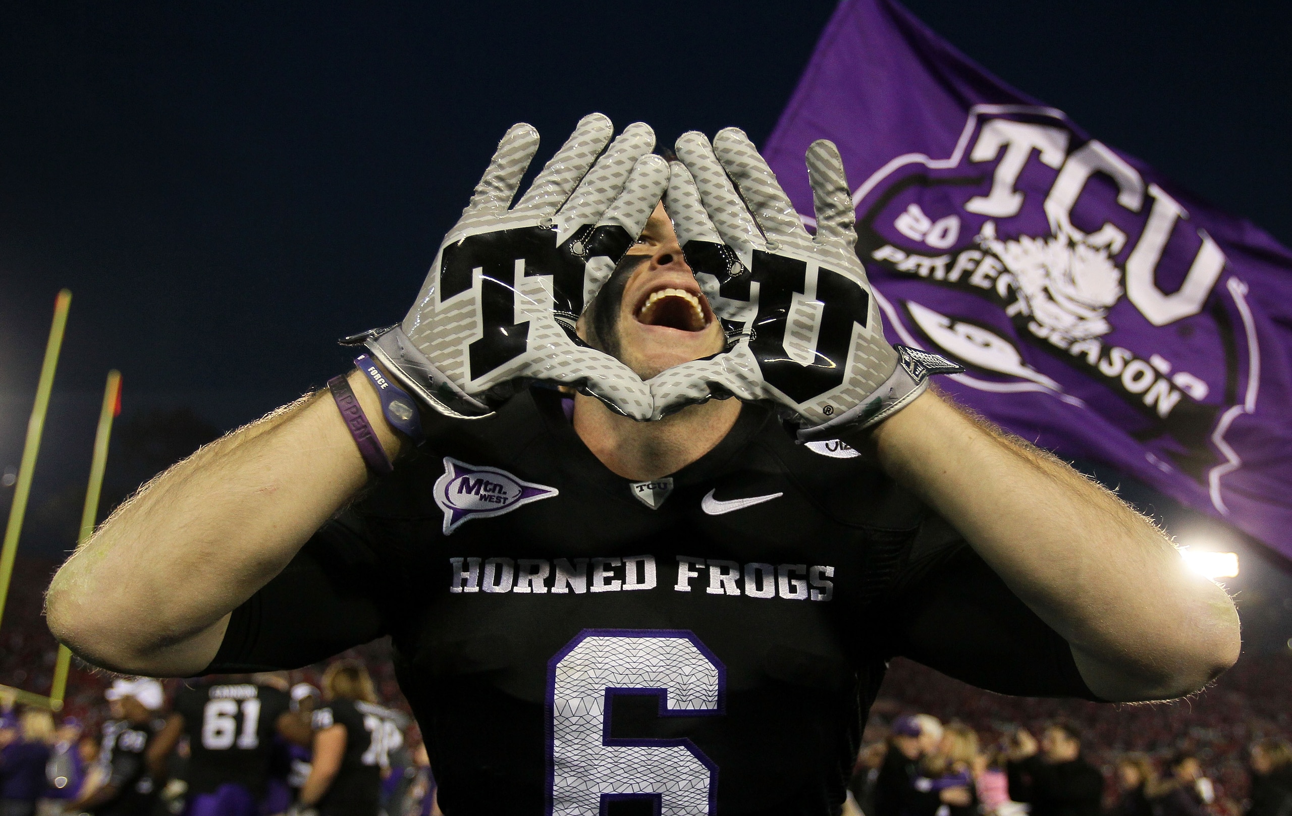 PASADENA, CA - JANUARY 01: Wide receiver Bart Johnson #6 of the TCU Horned Frogs celebrates after defeating the Wisconsin Badgers 21-19 in the 97th Rose Bowl game on January 1, 2011 in Pasadena, California. (Photo by Jeff Gross/Getty Images) PASADENA, CA - JANUARY 01: Wide receiver Bart Johnson #6 of the TCU Horned Frogs celebrates after defeating the Wisconsin Badgers 21-19 in the 97th Rose Bowl game on January 1, 2011 in Pasadena, California. (Photo by Jeff Gross/Getty Images)