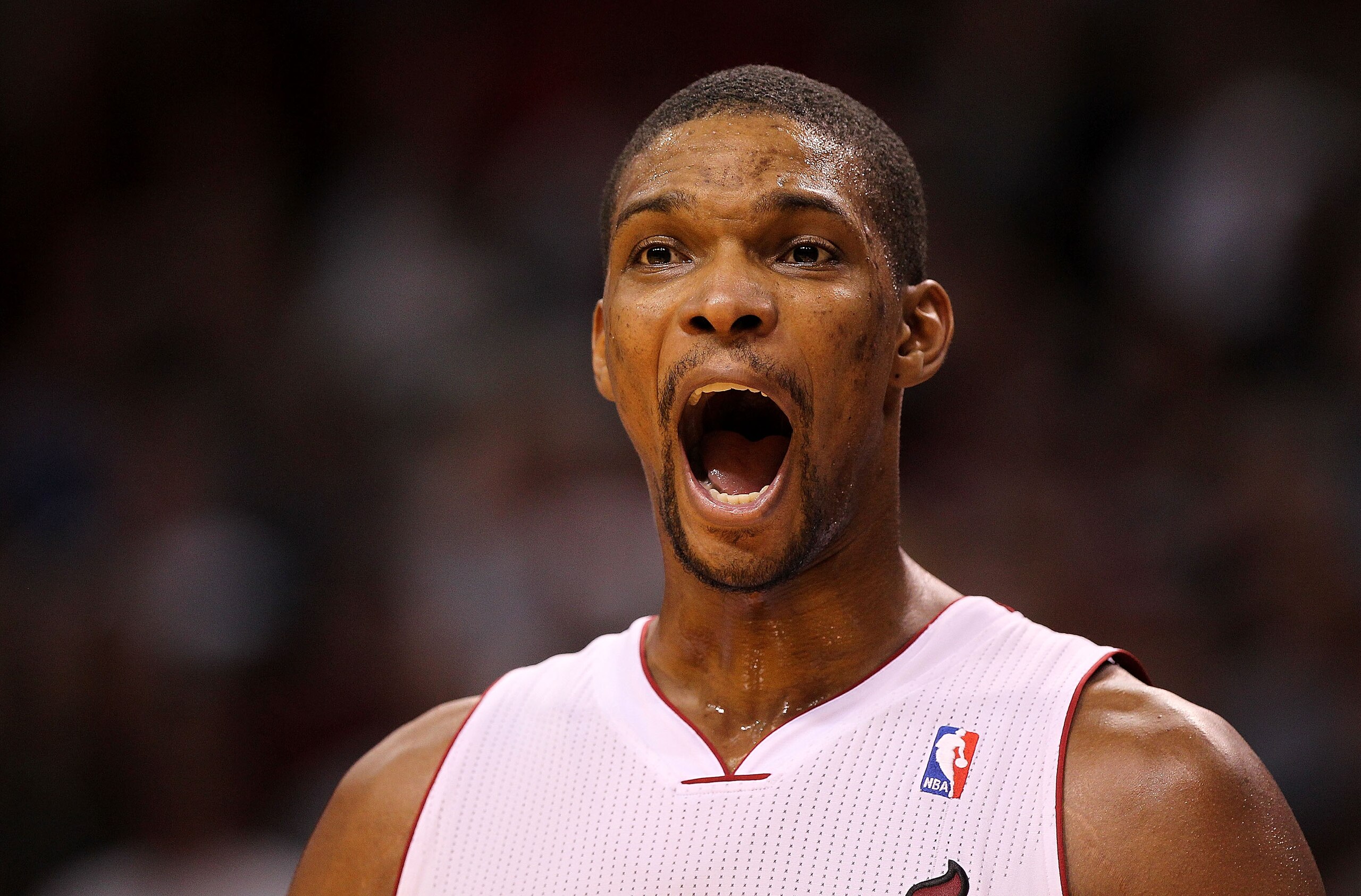 MIAMI, FL - FEBRUARY 08:  Chris Bosh #1 of the Miami Heat talks with a referee during a game against the Indiana Pacers at American Airlines Arena on February 8, 2011 in Miami, Florida. NOTE TO USER: User expressly acknowledges and agrees that, by downloa
