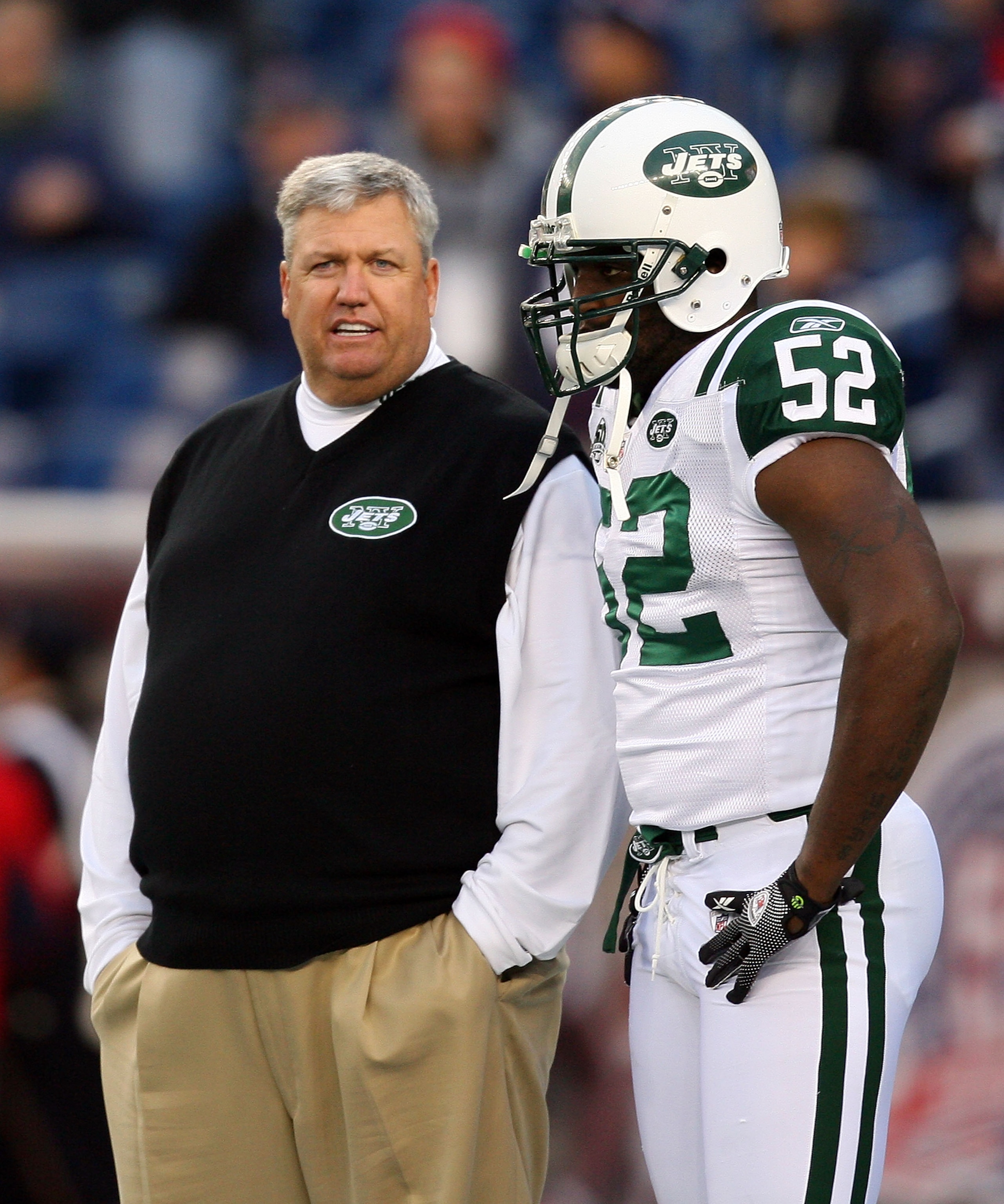 FOXBORO, MA - NOVEMBER 22:  Coach Rex Ryan of the New York Jets chats with David Harris #52 before a game against the New England Patriots at Gillette Stadium on November 22, 2009 in Foxboro, Massachusetts. (Photo by Jim Rogash/Getty Images)