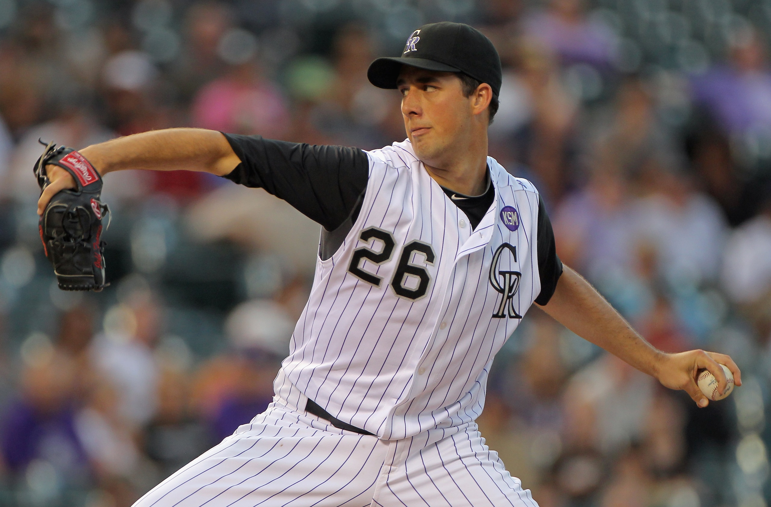 DENVER - SEPTEMBER 13: Starting pitcher Jeff Francis #26 of the Colorado Rockies delivers against the San Diego Padres at Coors Field on September 13, 2010 in Denver, Colorado. (Photo by Doug Pensinger/Getty Images) DENVER - SEPTEMBER 13: Starting pitcher Jeff Francis #26 of the Colorado Rockies delivers against the San Diego Padres at Coors Field on September 13, 2010 in Denver, Colorado. (Photo by Doug Pensinger/Getty Images)