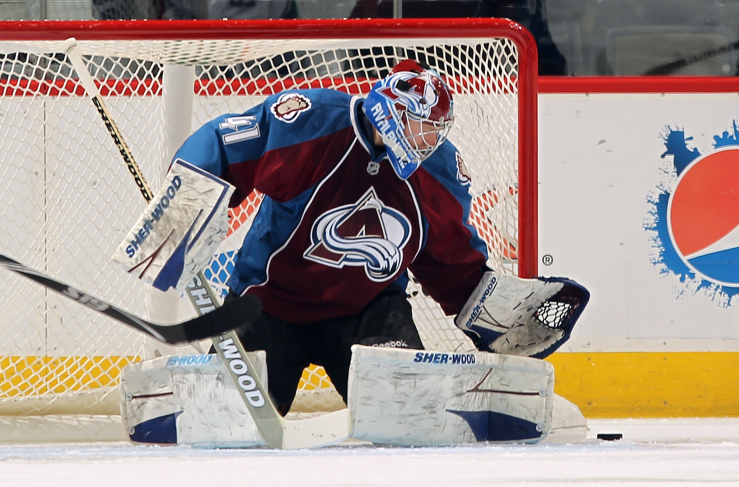 DENVER, CO - JANUARY 18:  Goalie Craig Anderson #41 of the Colorado Avalanche makes a save against the Vancouver Canucks at the Pepsi Center on January 18, 2011 in Denver, Colorado. The Avalanche defeated the Canucks 4-3 in overtime.  (Photo by Doug Pensi
