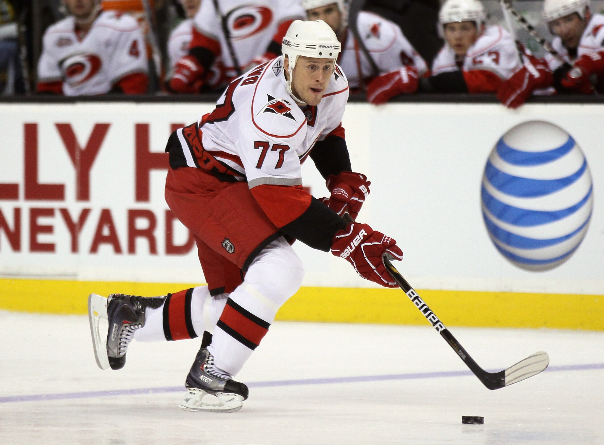 BOSTON - NOVEMBER 26:  Joe Corvo #77 of the Carolina Hurricanes takes the puck in the second period against the Boston Bruins on November 26, 2010 at the TD Garden in Boston, Massachusetts.  (Photo by Elsa/Getty Images)