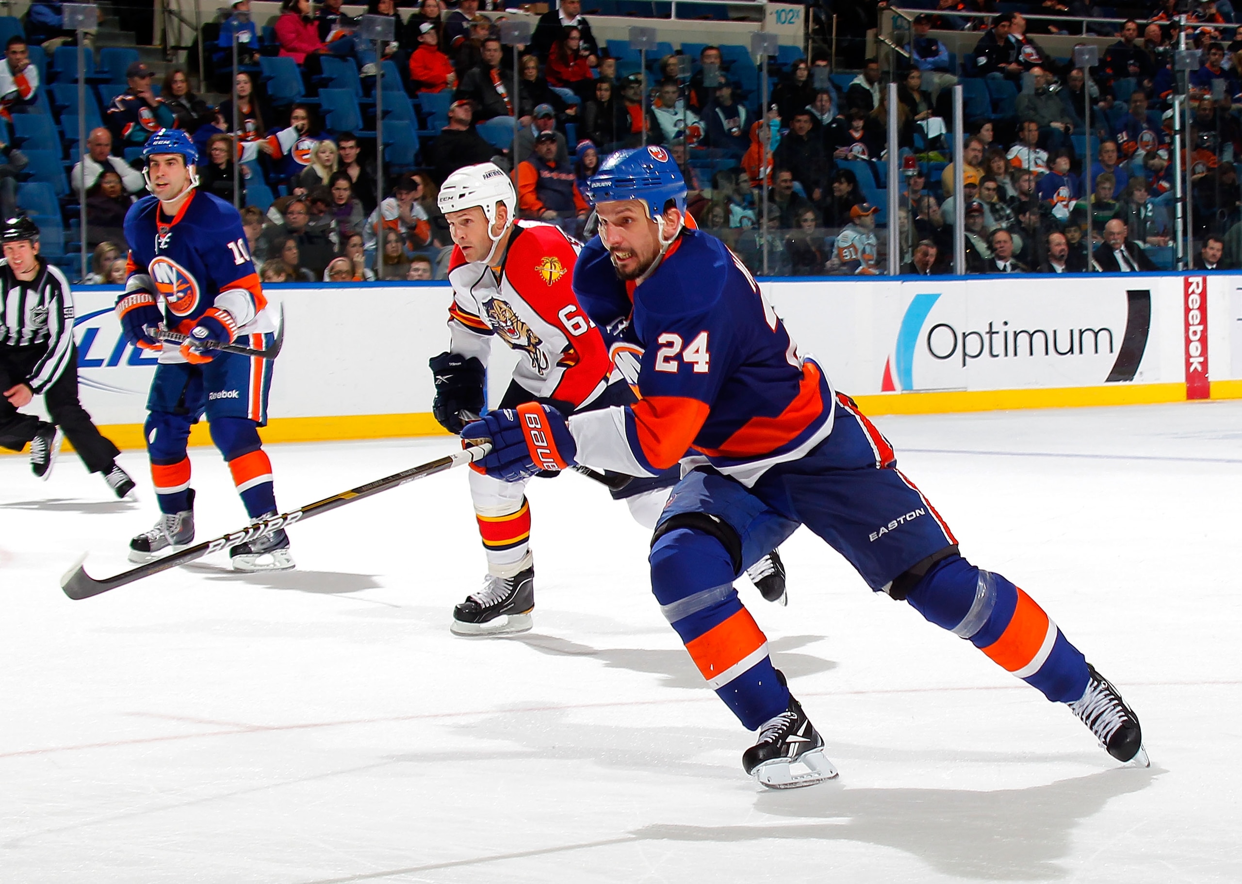 UNIONDALE, NY - NOVEMBER 20:  Radek Martinek #24 of the New York Islanders skates up ice during a hockey game against the Florida Panthers at the Nassau Coliseum on November 20, 2010 in Uniondale, New York.  (Photo by Paul Bereswill/Getty Images)