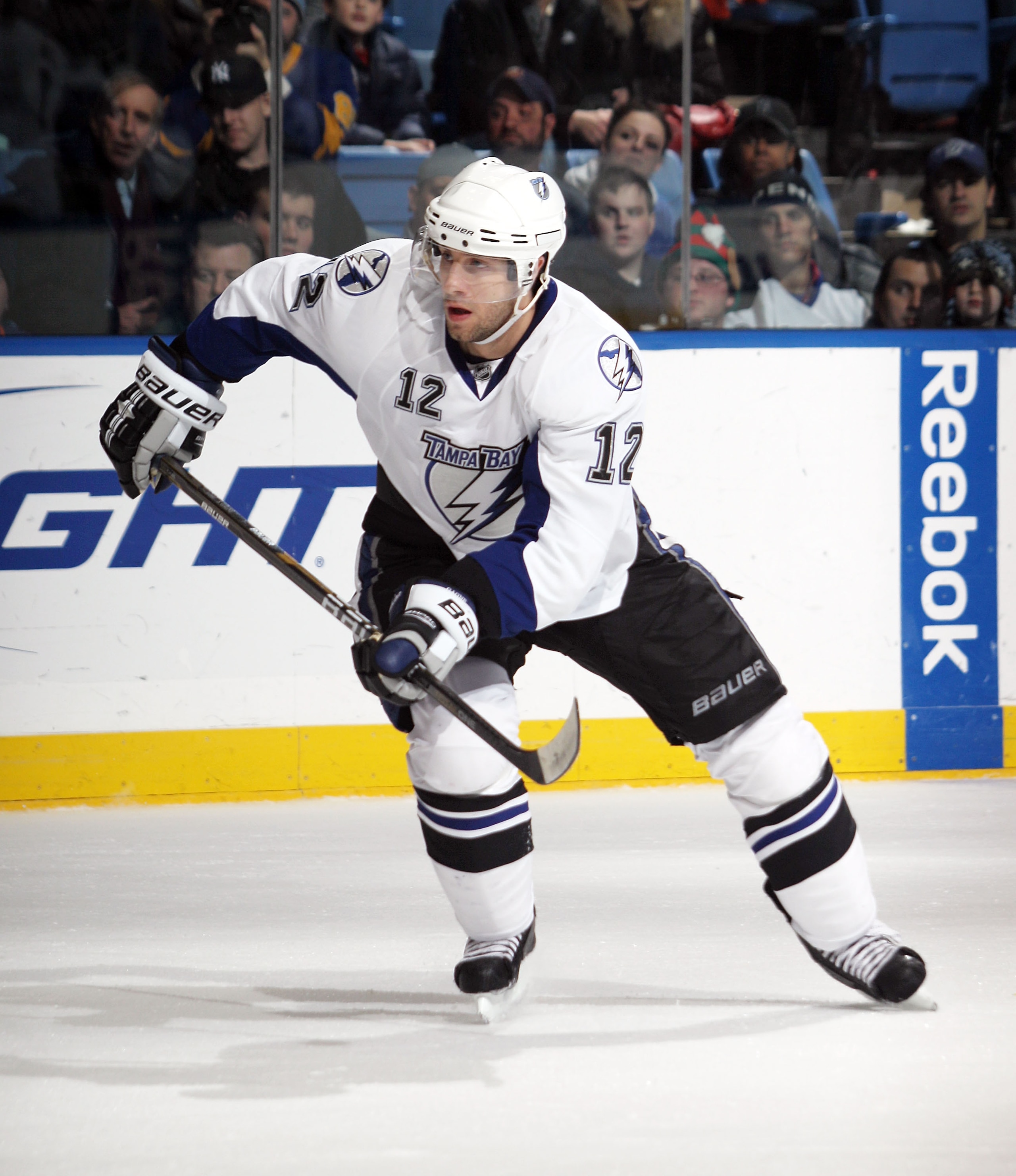 UNIONDALE, NY - DECEMBER 22: Simon Gagne #12 of the Tampa Bay Lightning skates against the New York Islanders at the Nassau Coliseum on December 22, 2010 in Uniondale, New York. (Photo by Bruce Bennett/Getty Images) UNIONDALE, NY - DECEMBER 22: Simon Gagne #12 of the Tampa Bay Lightning skates against the New York Islanders at the Nassau Coliseum on December 22, 2010 in Uniondale, New York. (Photo by Bruce Bennett/Getty Images)