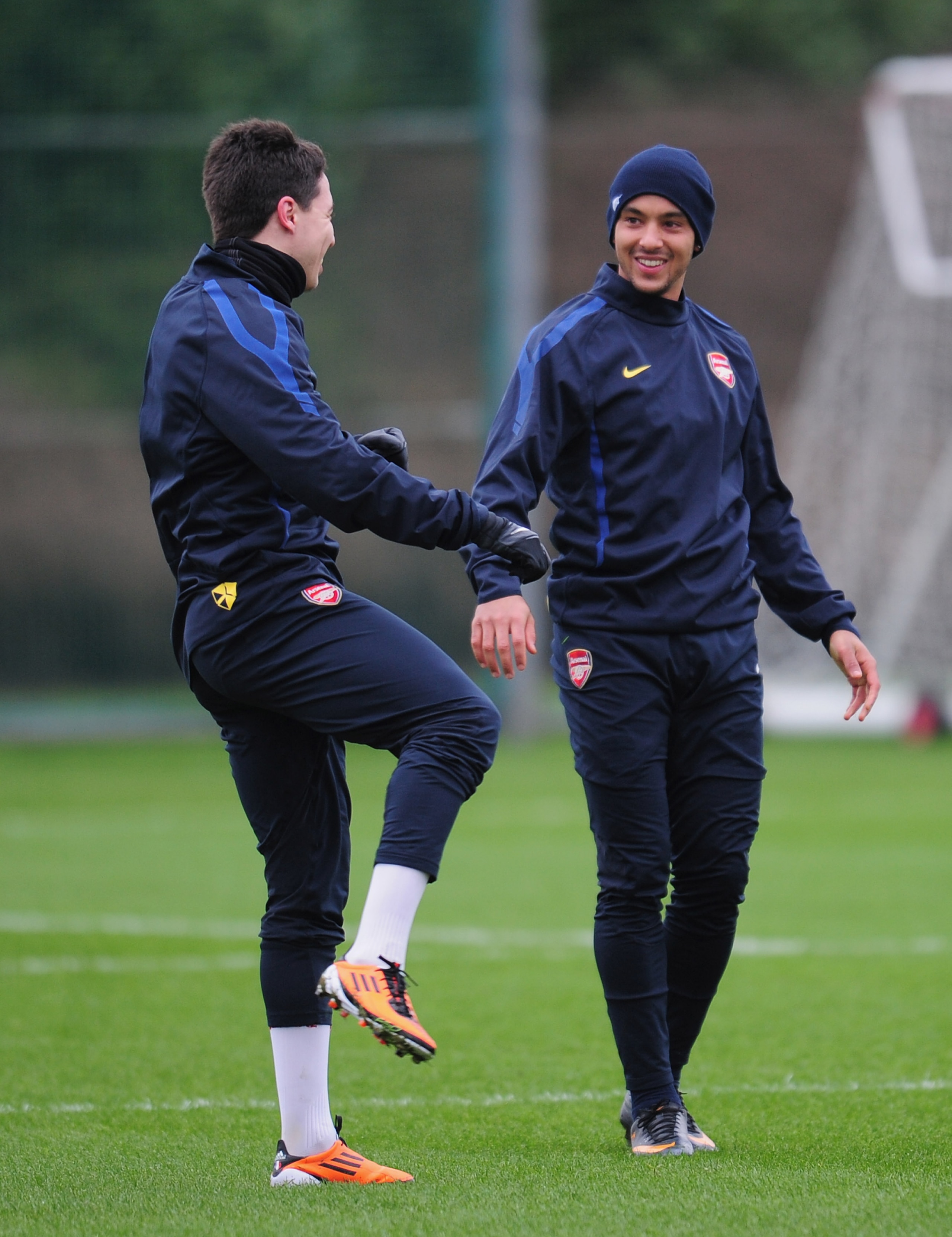ST ALBANS, ENGLAND - FEBRUARY 15: Theo Walcott and Samir Nasri of Arsenal warm-up during training at London Colney on February 15, 2011 in St Albans, England. (Photo by Shaun Botterill/Getty Images) ST ALBANS, ENGLAND - FEBRUARY 15: Theo Walcott and Samir Nasri of Arsenal warm-up during training at London Colney on February 15, 2011 in St Albans, England. (Photo by Shaun Botterill/Getty Images)