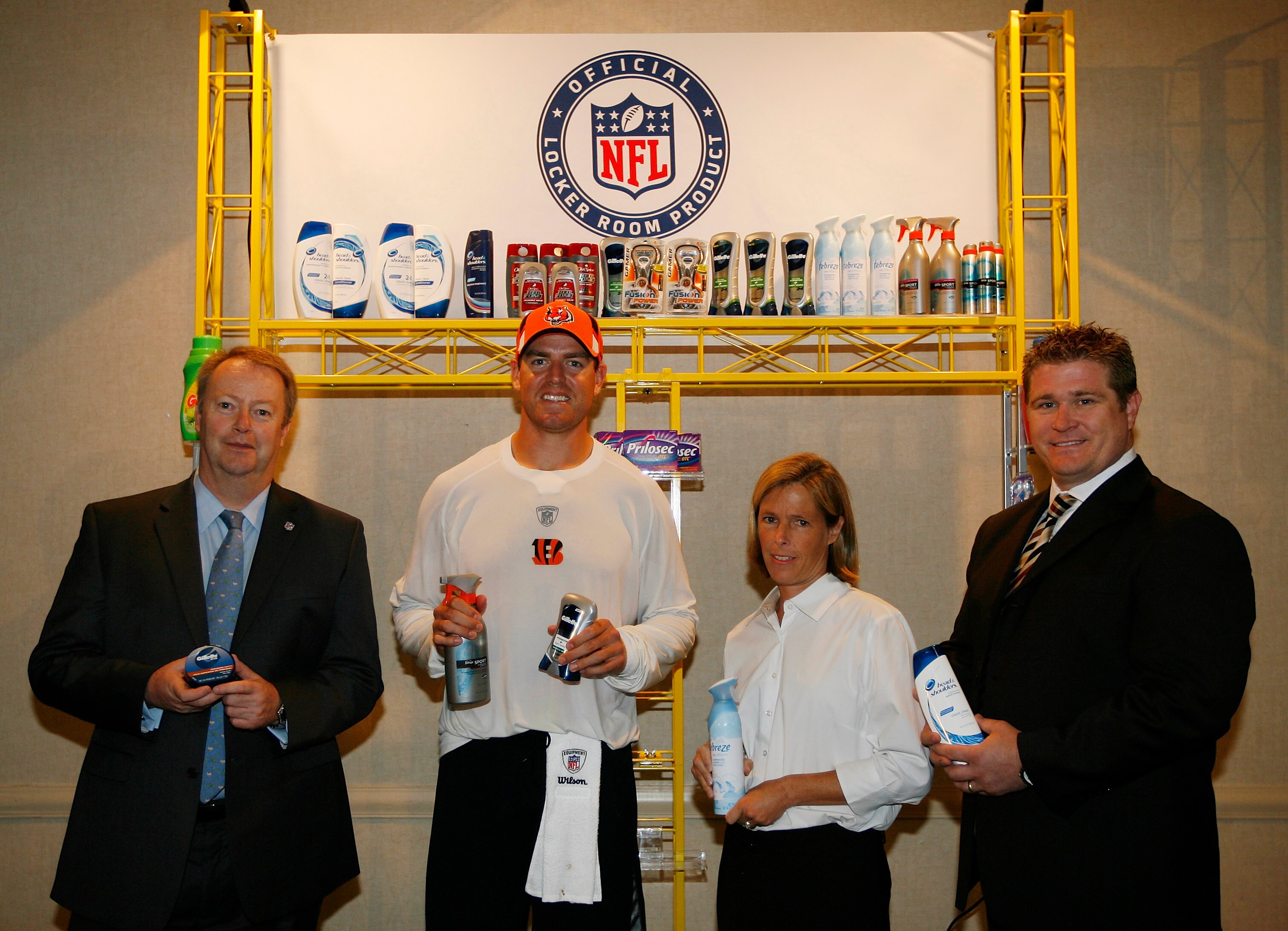 GEORGETOWN, KY -(LtoR) NFL Senior VP of Sales Mark Waller, Cincinnati Bengals' quarterback Carson Palmer, Cincinnati Bengals' Executive Vice President Katie Blackburn and P&G Director of Global Sports Marketing pose for a picture during the P&G NFL Partne