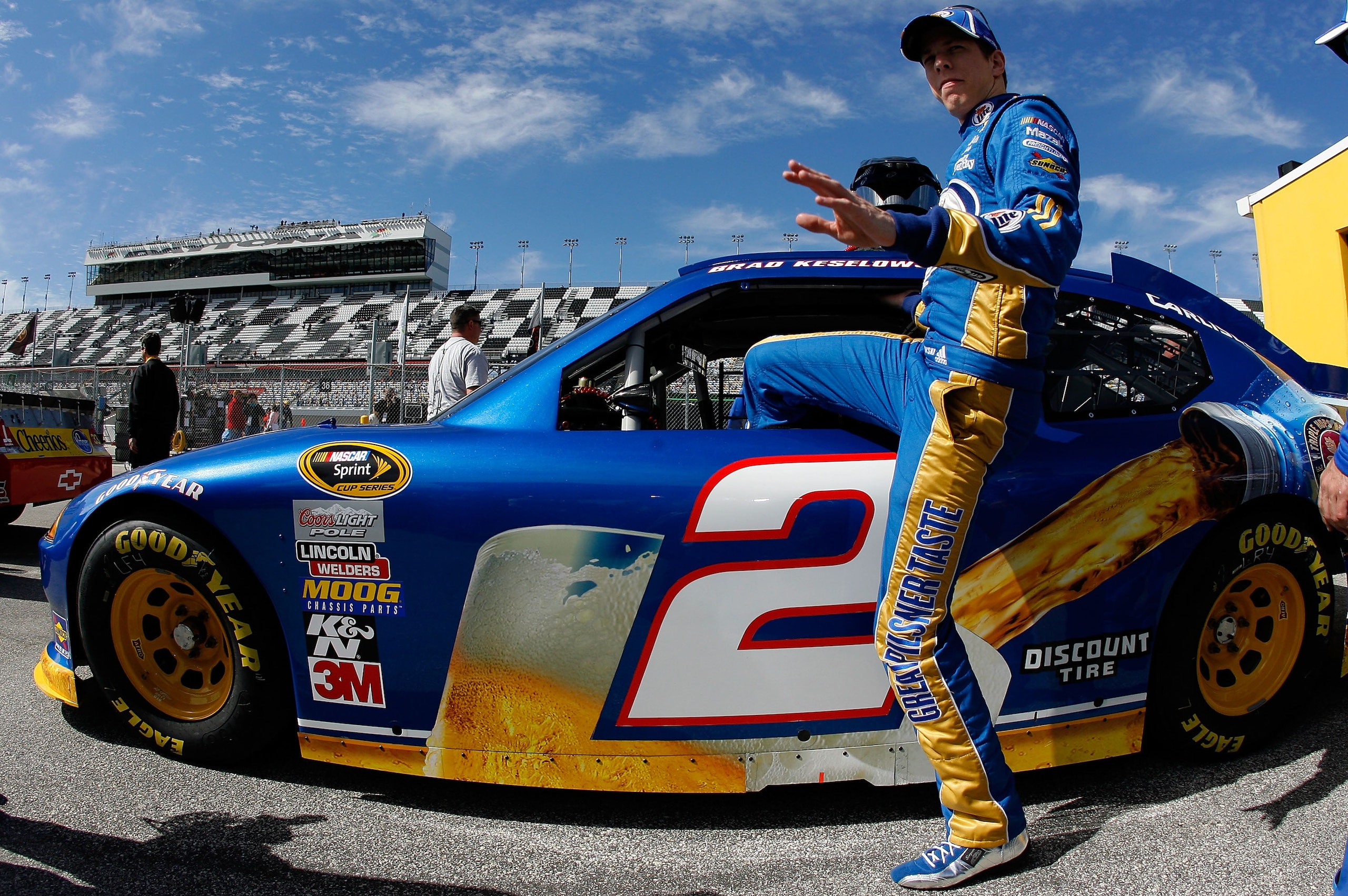 DAYTONA BEACH, FL - FEBRUARY 12: Brad Keselowski, driver of the #2 Miller Lite Dodge, climbs in to his car during practice for the NASCAR Sprint Cup Series Daytona 500 at Daytona International Speedway on February 12, 2011 in Daytona Beach, Florida. (Ph DAYTONA BEACH, FL - FEBRUARY 12: Brad Keselowski, driver of the #2 Miller Lite Dodge, climbs in to his car during practice for the NASCAR Sprint Cup Series Daytona 500 at Daytona International Speedway on February 12, 2011 in Daytona Beach, Florida. (Ph