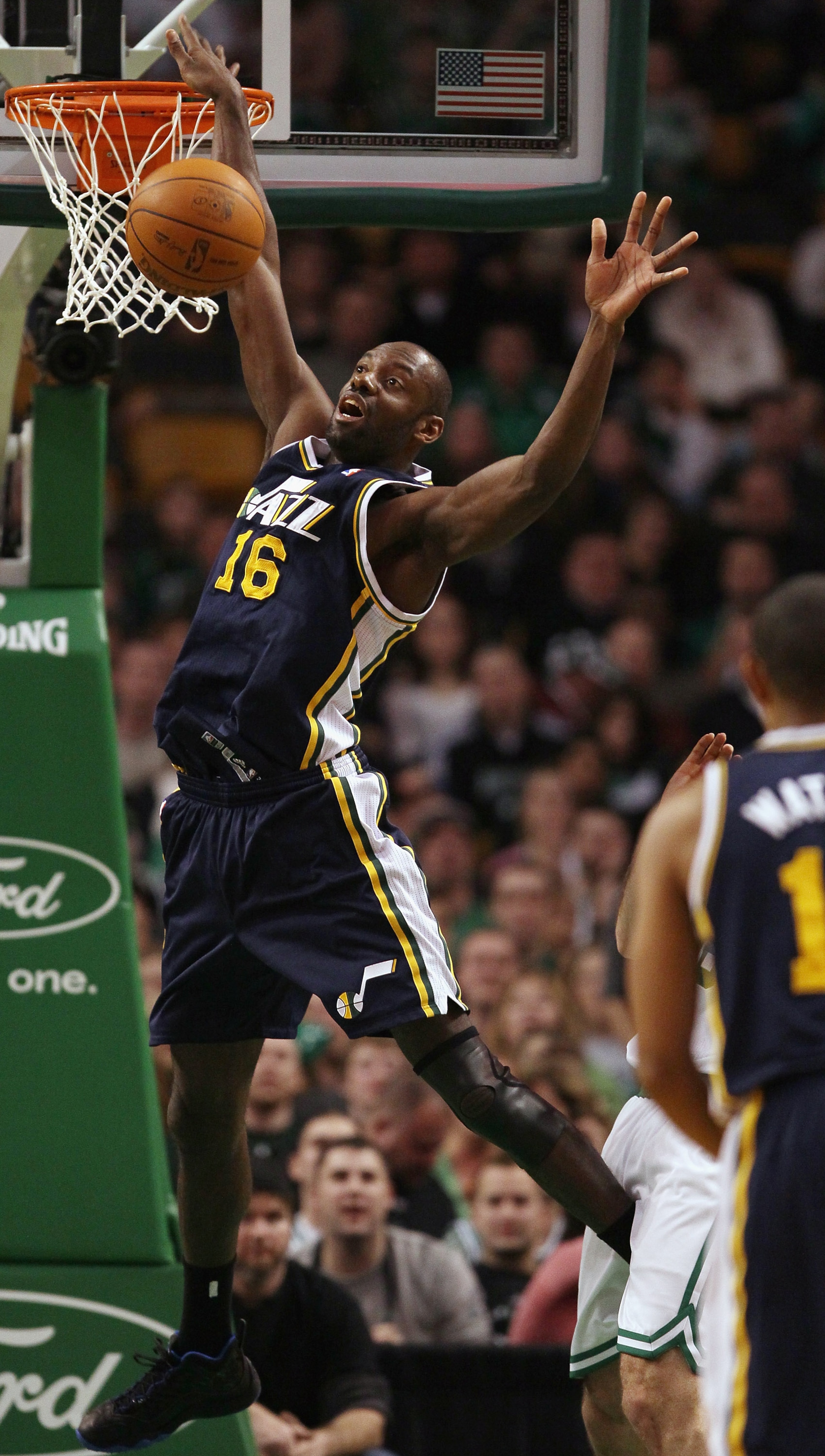 BOSTON, MA - JANUARY 21:  Francisco Elson # 16 of the Utah Jazz loses control of the ball in the second half against the Boston Celtics on January 21, 2011 at the TD Garden in Boston, Massachusetts.  The Celtics defeated the Jazz 110-86. NOTE TO USER: Use