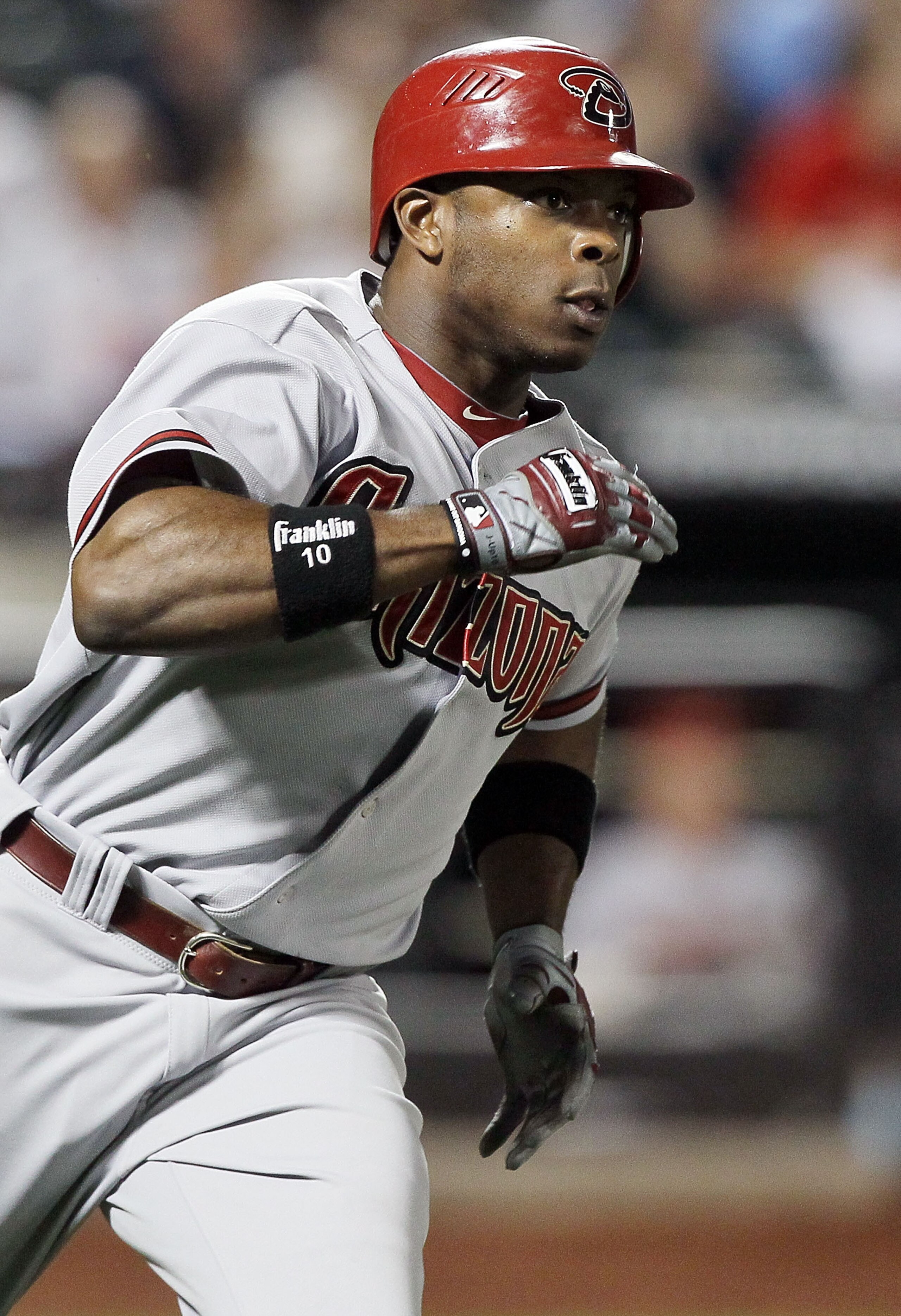 NEW YORK - JULY 31: Justin Upton #10 of the Arizona Diamondbacks runs after hitting a seventh inning two run single against the New York Mets on July 31, 2010 at Citi Field in the Flushing neighborhood of the Queens borough of New York City. (Photo by J NEW YORK - JULY 31: Justin Upton #10 of the Arizona Diamondbacks runs after hitting a seventh inning two run single against the New York Mets on July 31, 2010 at Citi Field in the Flushing neighborhood of the Queens borough of New York City. (Photo by J