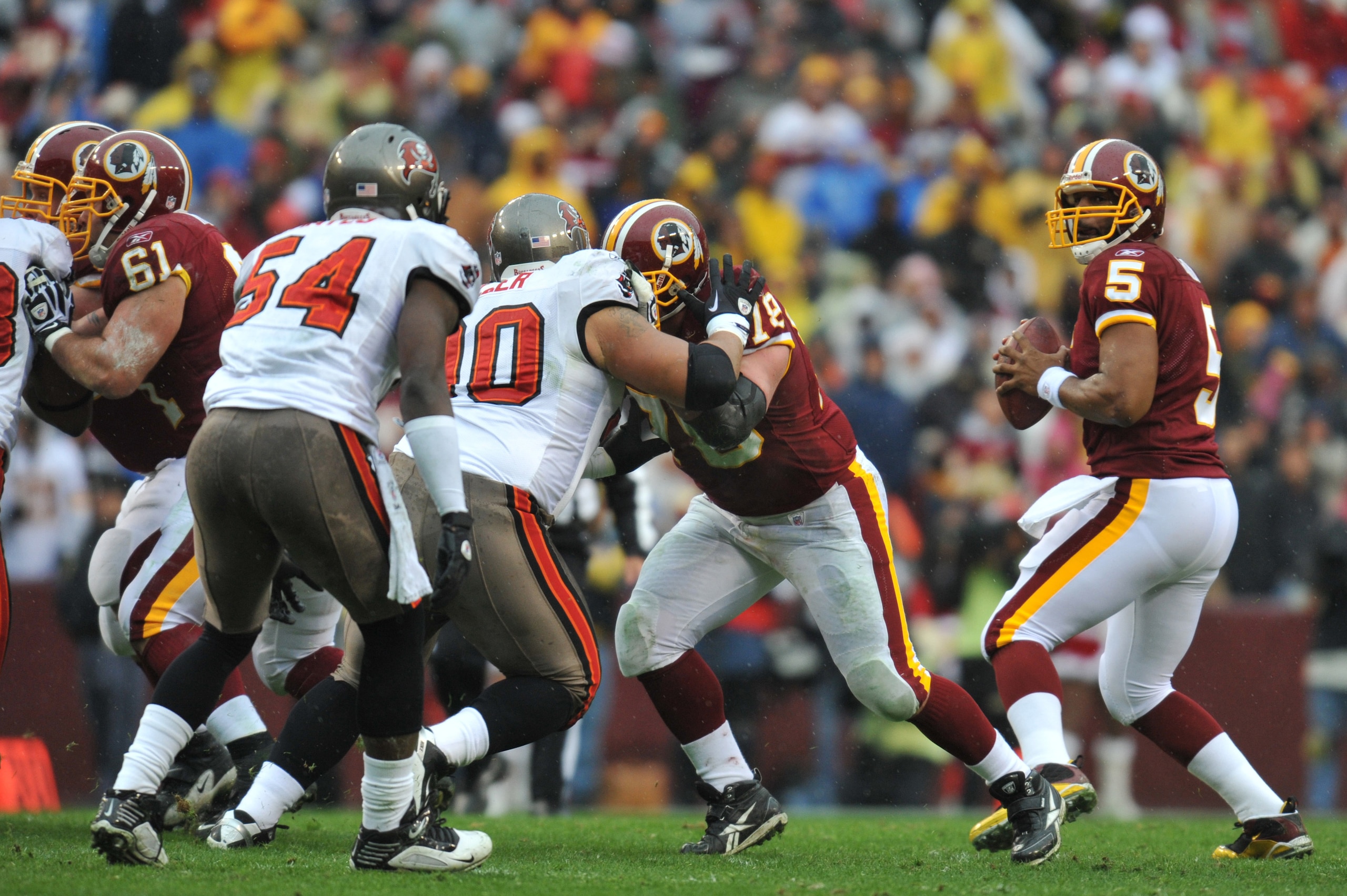 LANDOVER, MD - DECEMBER 12:  Donovan McNabb #5 of the Washington Redskins passes against the Tampa Bay Buccaneers  at FedExField on December 12, 2010 in Landover, Maryland. The Buccaneers defeated the Redskins 17-16. (Photo by Larry French/Getty Images)