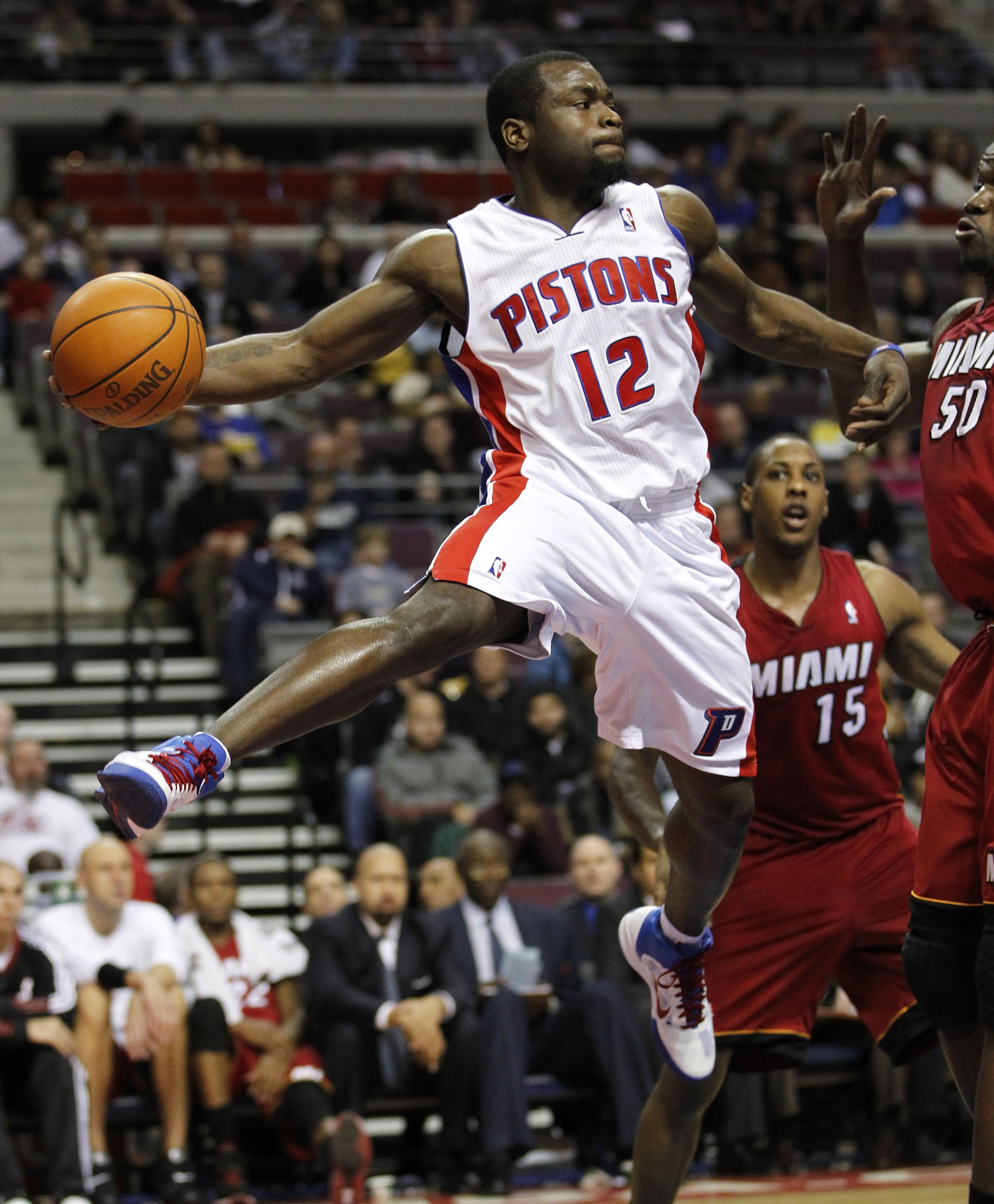 AUBURN HILLS, MI - FEBRUARY 11:  Will Bynum #12 of the Detroit Pistons look for a pass next to Mario Chalmers #15 at The Palace of Auburn Hills on February 11, 2011 in Auburn Hills, Michigan. Miami won the game 106-92. NOTE TO USER: User expressly acknowl