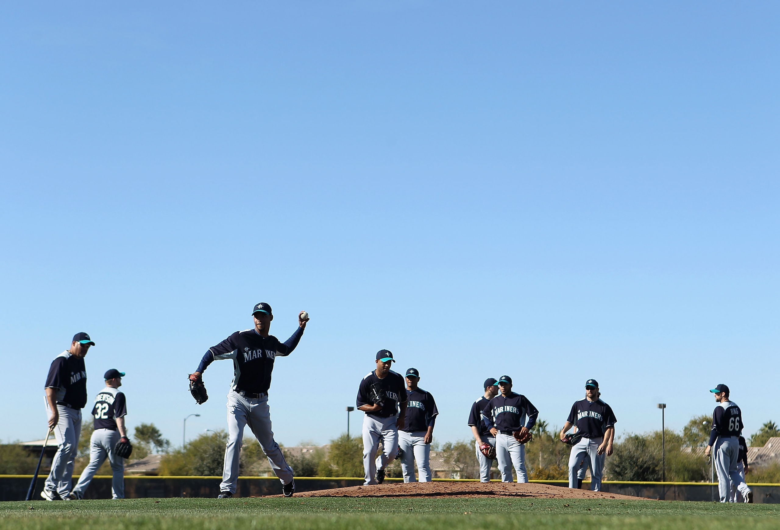 PEORIA, AZ - FEBRUARY 15:  Pitcher Edward Paredes #65 of the Seattle Mariners throws during a MLB spring training practice at Peoria Stadium on February 15, 2011 in Peoria, Arizona.  (Photo by Christian Petersen/Getty Images)