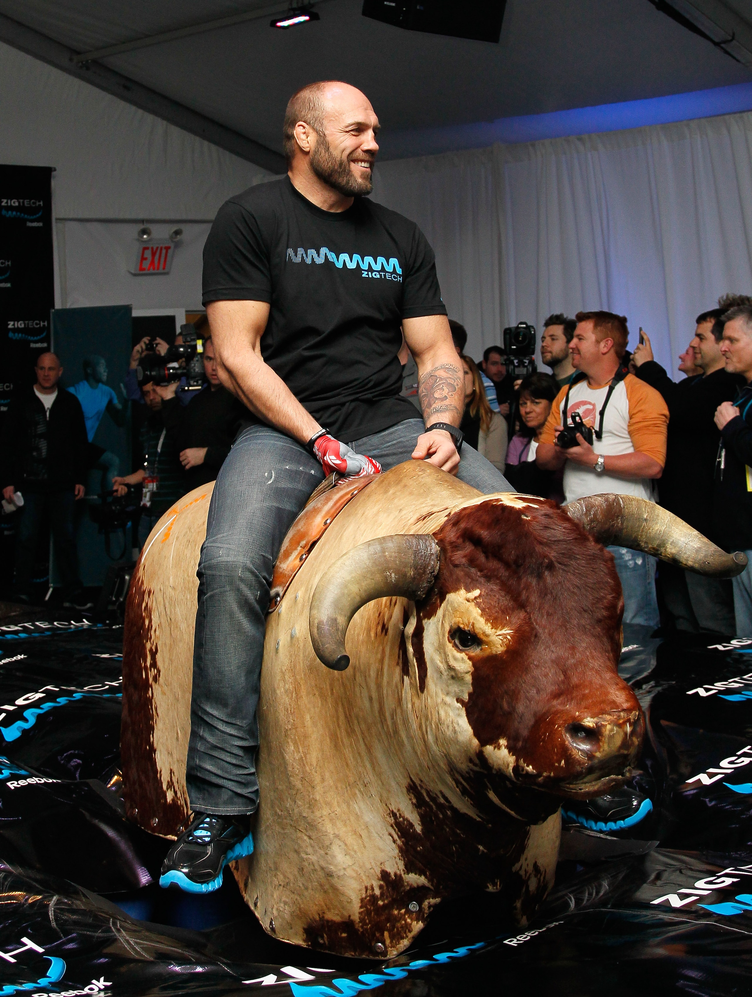 DALLAS, TX - FEBRUARY 04: MMA champion Randy Couture attends the 'ZigTech Cowboy Up Challenge' hosted by Reebok as MMA champion Randy Couture rides a mechanical bull on February 4, 2011 in Dallas, Texas. (Photo by Kevin C. Cox/Getty Images) DALLAS, TX - FEBRUARY 04: MMA champion Randy Couture attends the 'ZigTech Cowboy Up Challenge' hosted by Reebok as MMA champion Randy Couture rides a mechanical bull on February 4, 2011 in Dallas, Texas. (Photo by Kevin C. Cox/Getty Images)