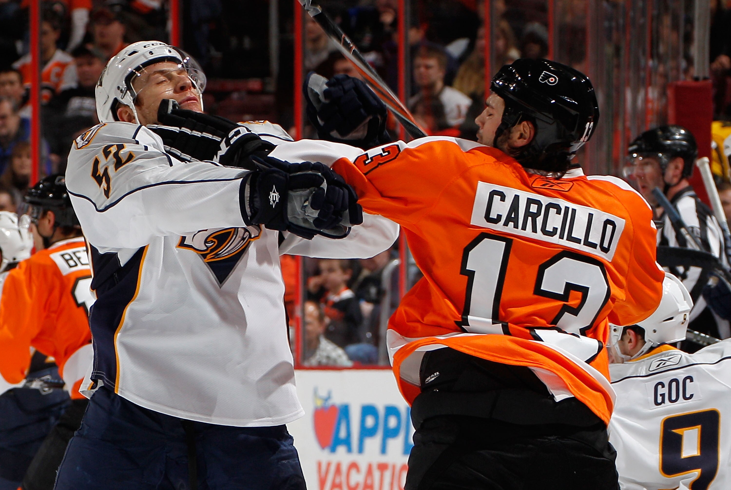 PHILADELPHIA, PA - FEBRUARY 03:  Alexander Sulzer #52 of the Nashville Predators fights with Daniel Carcillo #13 of the Philadelphia Flyers during the second period of an NHL hockey game at the Wells Fargo Center on February 3, 2011 in Philadelphia, Penns