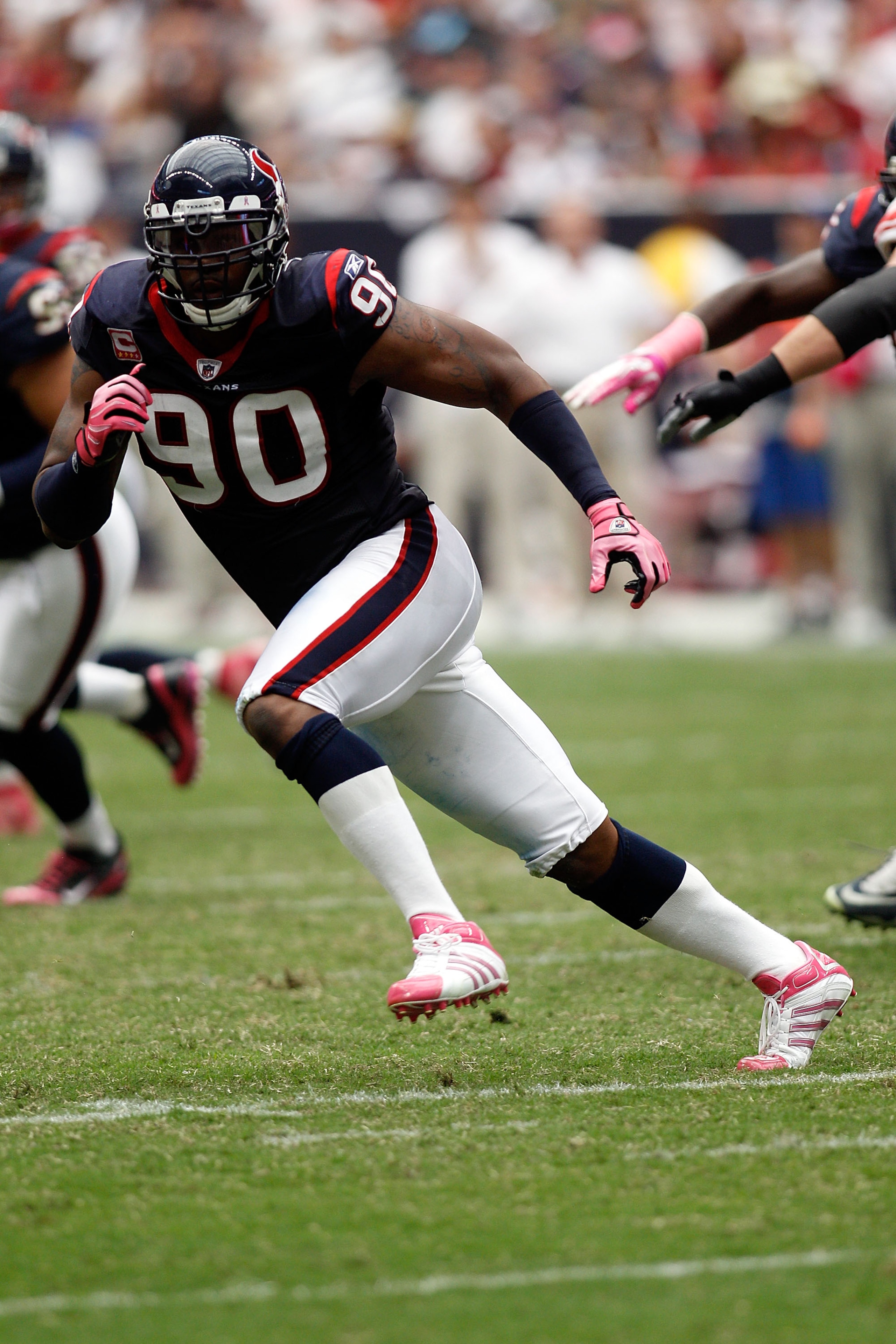 HOUSTON - OCTOBER 10:  Mario Williams #90 of the Houston Texans in action during the game against the New York Giants at Reliant Stadium on October 10, 2010 in Houston, Texas.  (Photo by Chris Graythen/Getty Images)