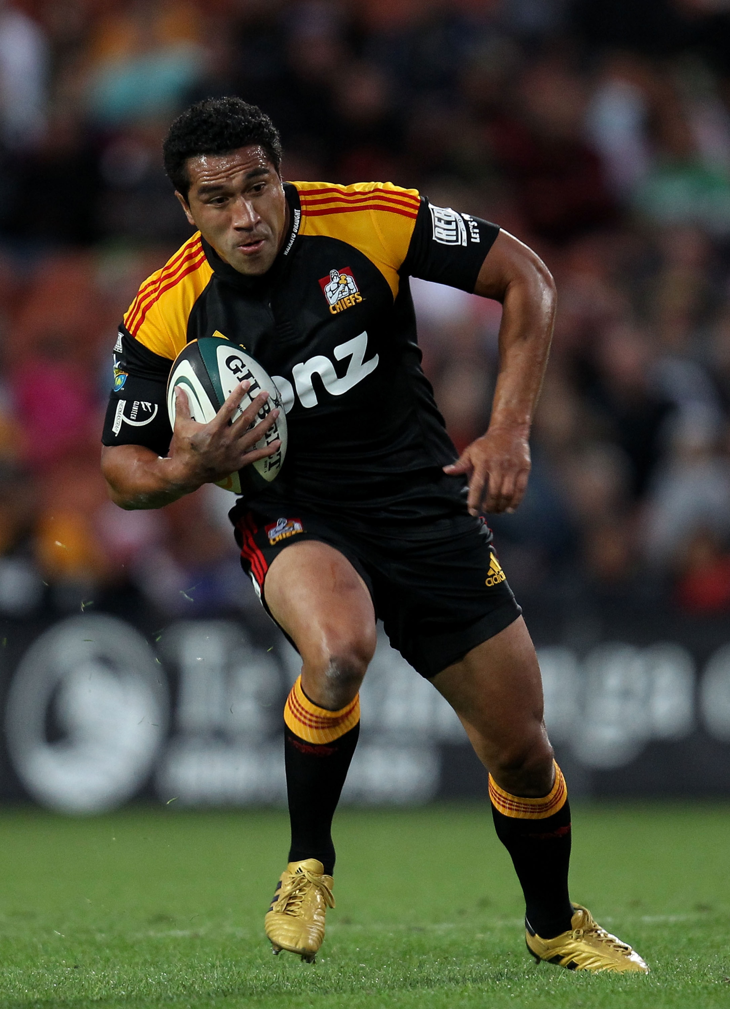 HAMILTON, NEW ZEALAND - MARCH 12:  Mils Muliaina of the Chiefs on the burst during the round five Super 14 match between the Chiefs and the Crusaders at Waikato Stadium on March 12, 2010 in Hamilton, New Zealand.  (Photo by Phil Walter/Getty Images)