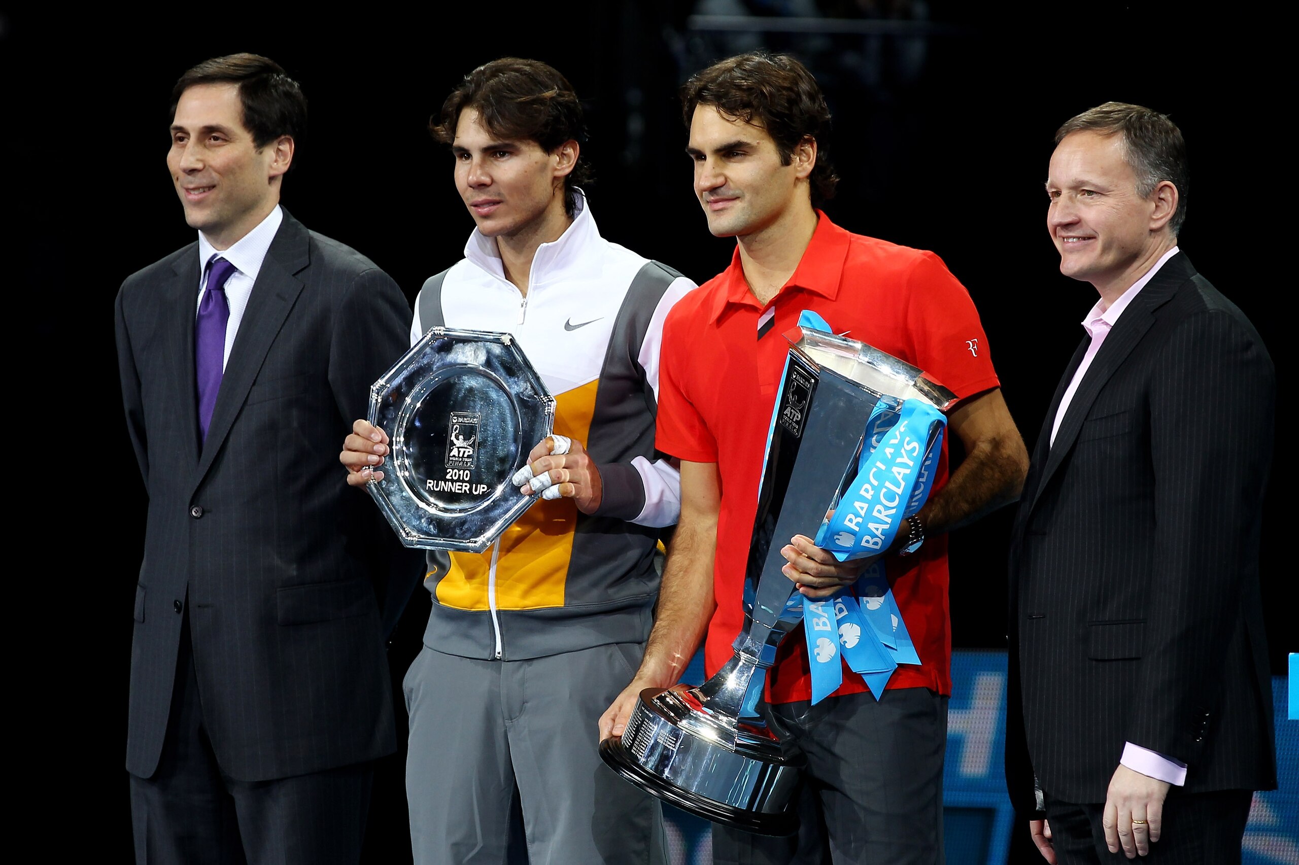 LONDON, ENGLAND - NOVEMBER 28:  (L-R) ATP Executive Chairman & President Adam Helfant, Rafael Nadal of Spain, Roger Federer of Switzerland and CE of Barclays Global Retail Banking Antony Jenkins pose after their men's final match during the ATP World Tour
