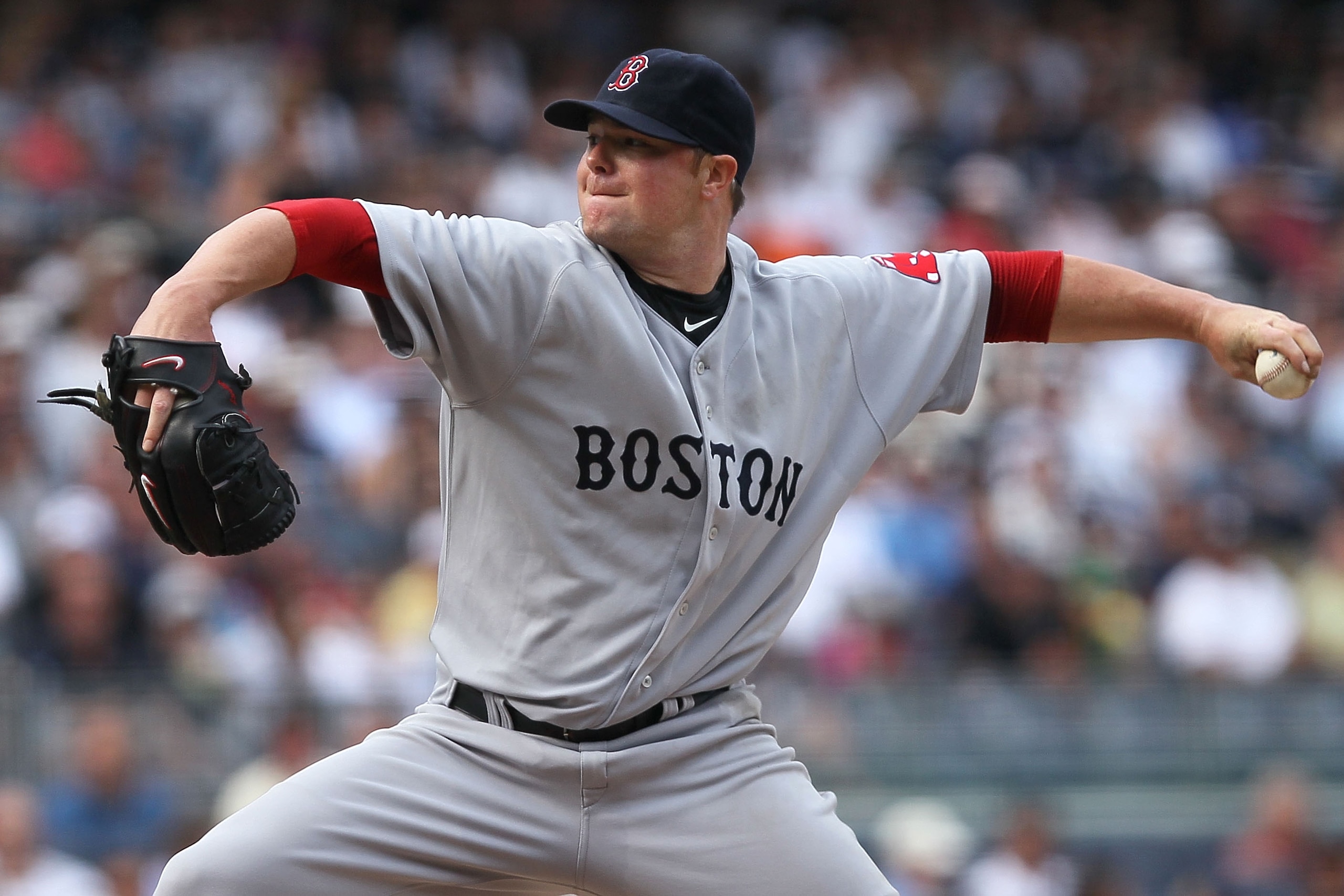 NEW YORK - AUGUST 09:  Jon Lester #31 of the Boston Red Sox pitches against the New York Yankees during their game on August 9, 2010 at Yankee Stadium in the Bronx borough of New York City.  (Photo by Chris McGrath/Getty Images)
