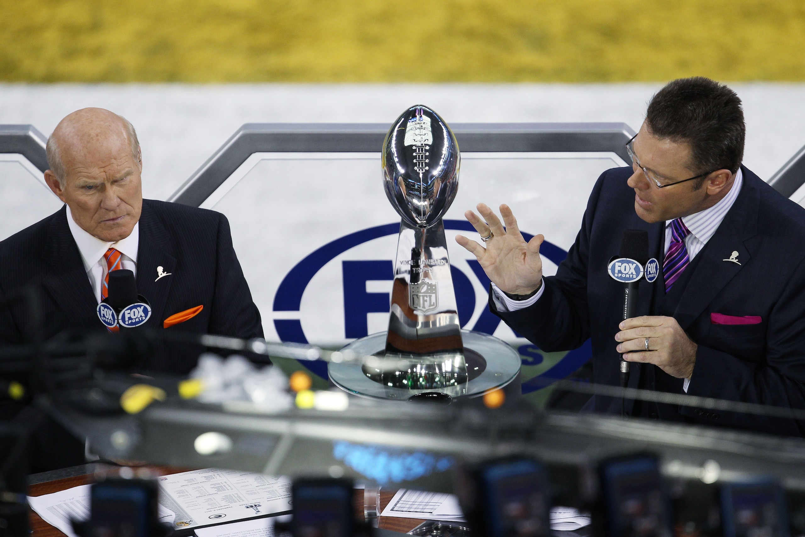 ARLINGTON, TX - FEBRUARY 06: Fox broadcasters, Terry Bradshaw (L) and Howie Long commentate prior to Super Bowl XLV between the Green Bay Packers and the Pittsburgh Steelers at Cowboys Stadium on February 6, 2011 in Arlington, Texas.  (Photo by Jonathan D