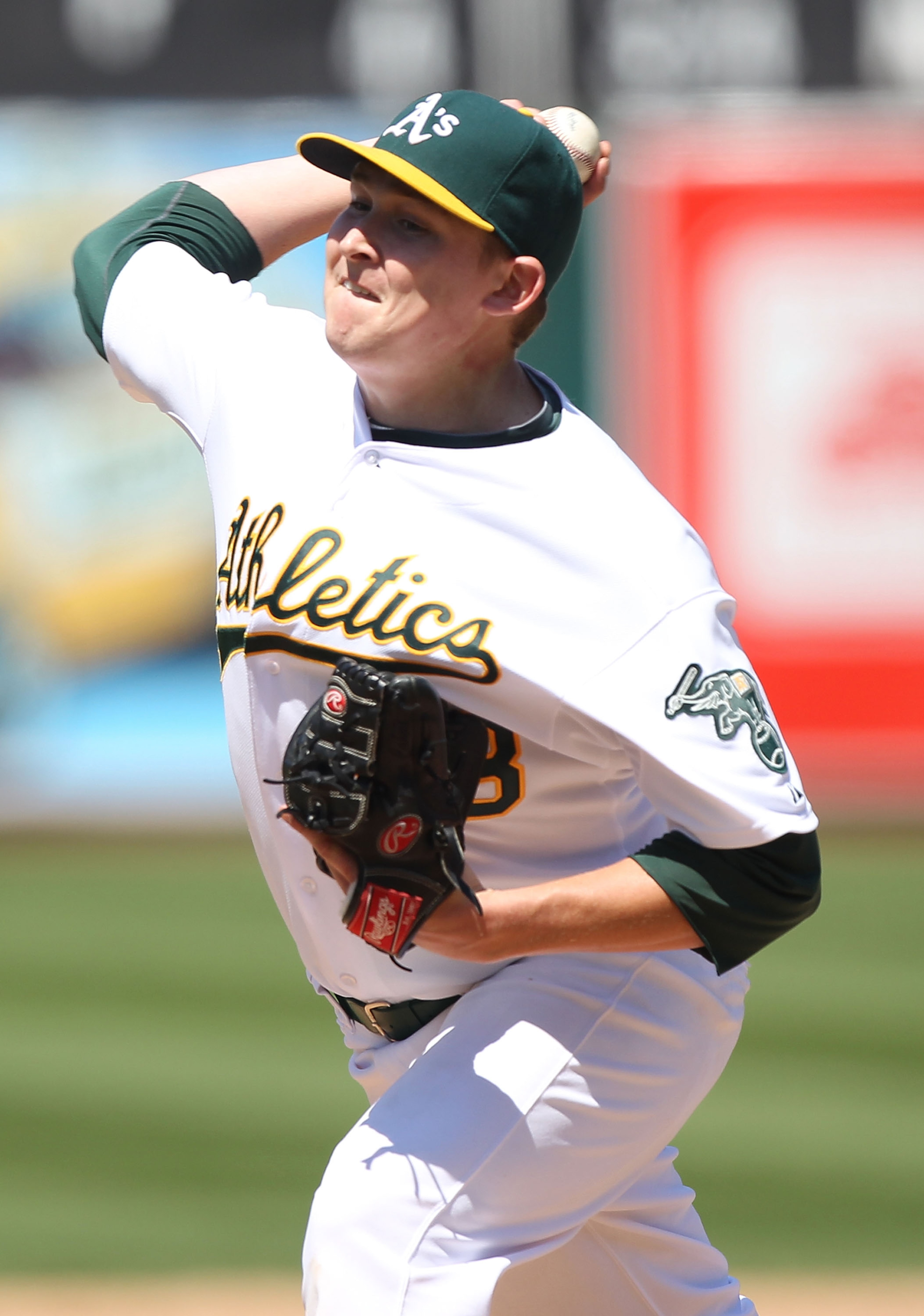 OAKLAND, CA - AUGUST 08:  Trevor Cahill #53 of the Oakland Athletics pitches against the Texas Rangers during an MLB game at the Oakland-Alameda County Coliseum on August 8, 2010 in Oakland, California.  (Photo by Jed Jacobsohn/Getty Images)