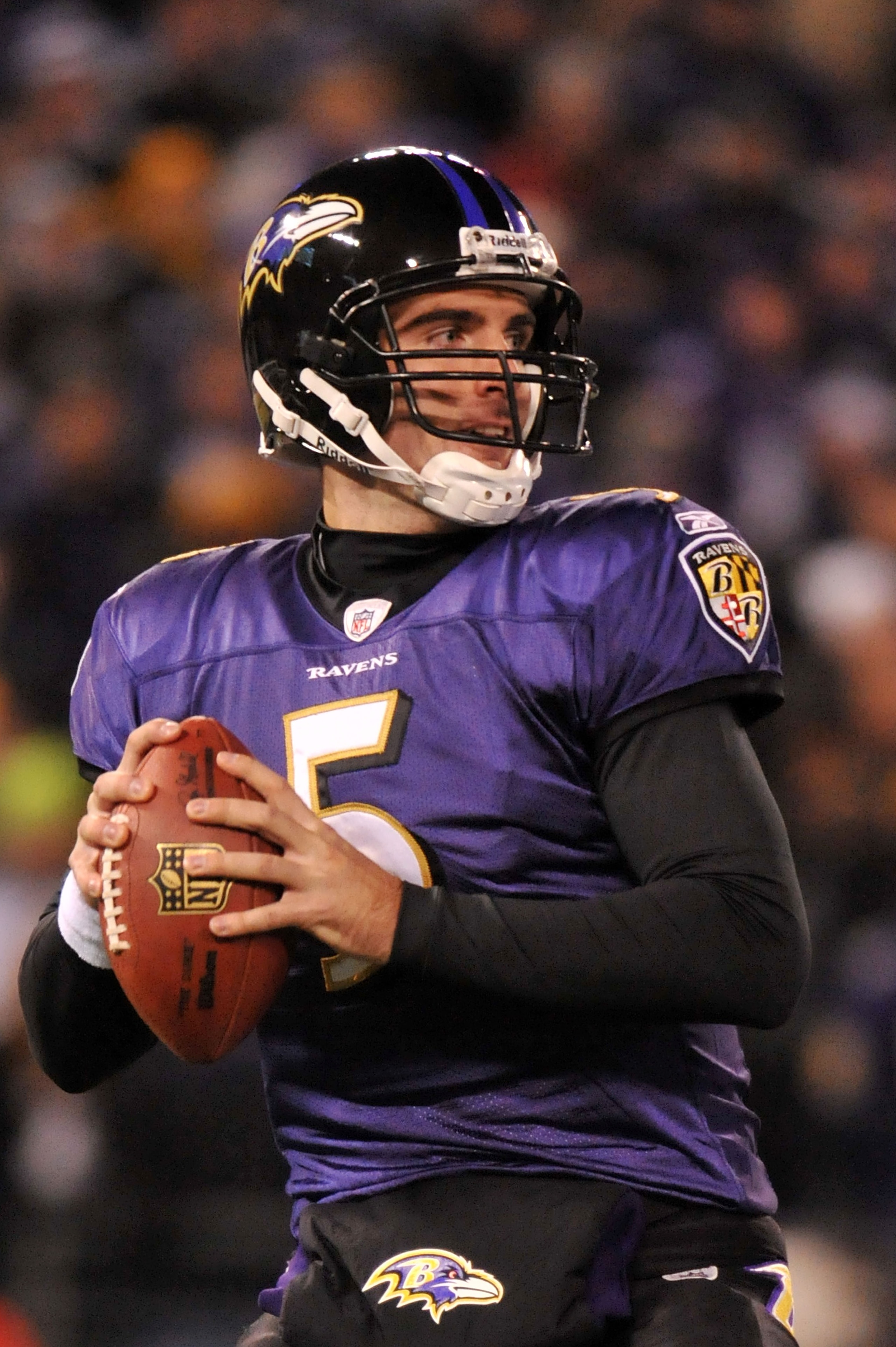 BALTIMORE, MD - DECEMBER 05:  Quarterback Joe Flacco #5 of the Baltimore Ravens looks to pass against the Pittsburgh Steelers at M&T Bank Stadium on December 5, 2010 in Baltimore, Maryland.  (Photo by Larry French/Getty Images)