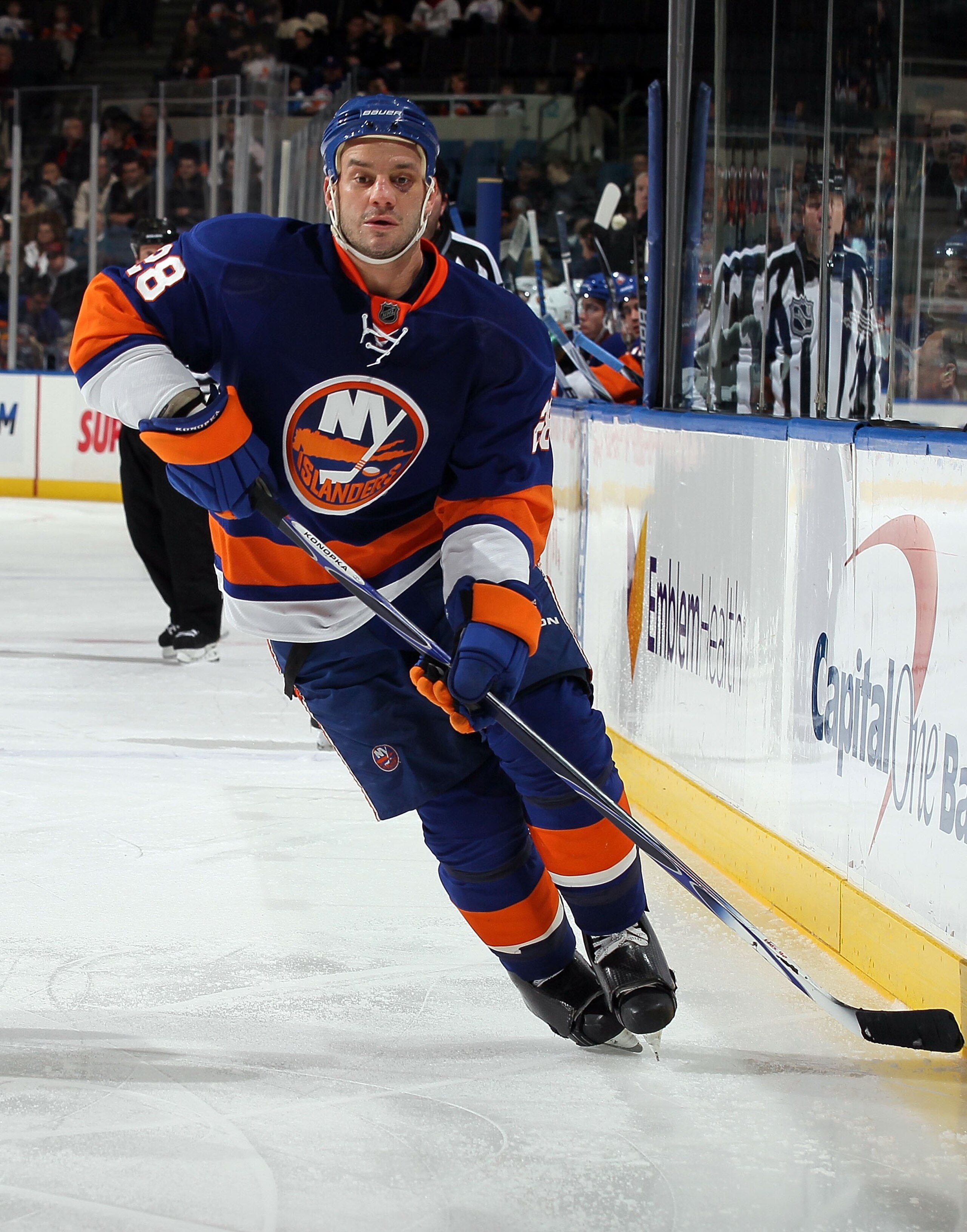 UNIONDALE, NY - DECEMBER 11:  Zenon Konopka #28 of the New York Islandersskates against the Atlanta Thrashers on December 11, 2010 at Nassau Coliseum in Uniondale, New York.  (Photo by Jim McIsaac/Getty Images)
