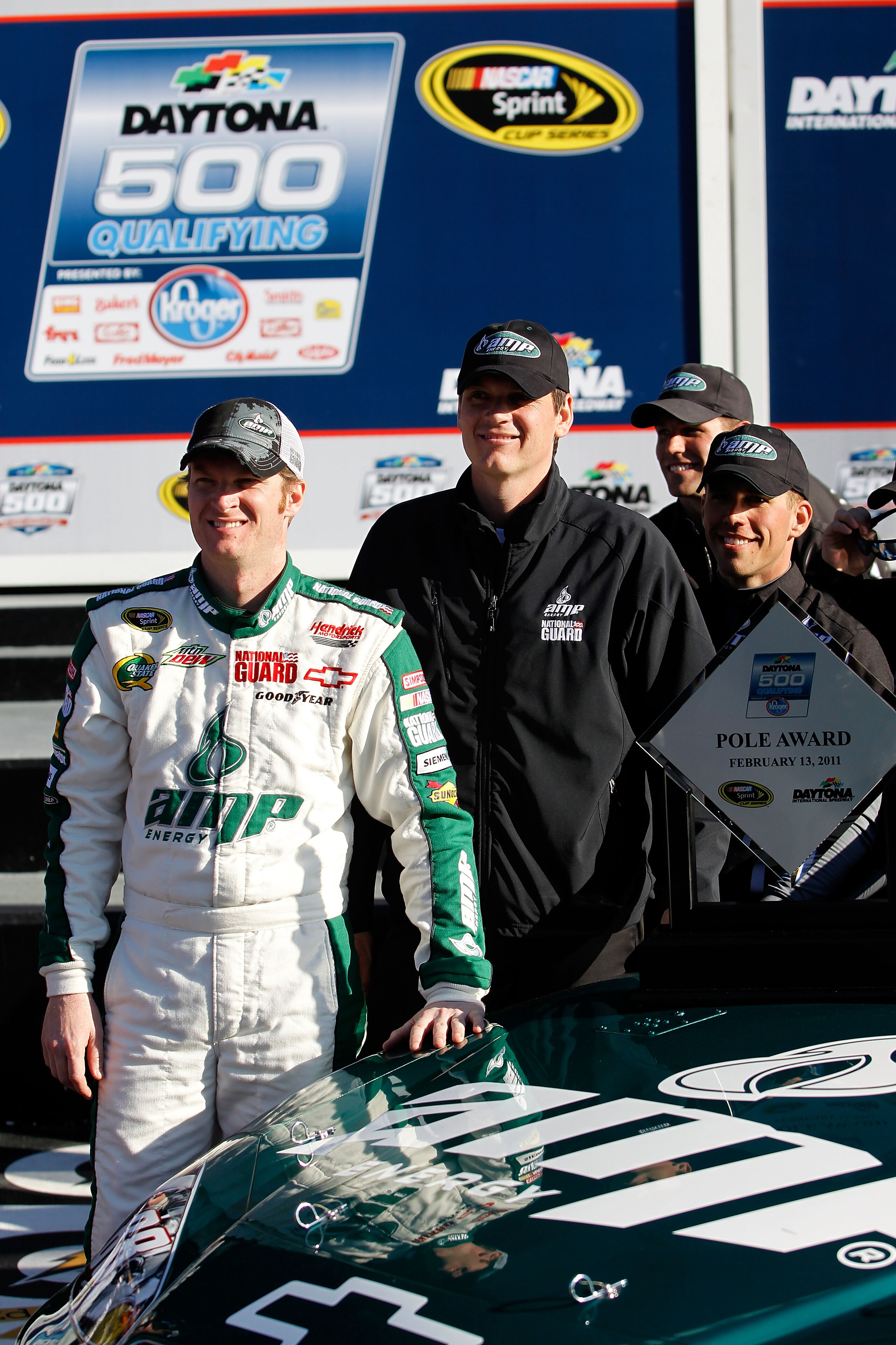 DAYTONA BEACH, FL - FEBRUARY 13:  Pole award winner Dale Earnhardt Jr., driver of the #88 National Guard/AMP Energy Chevrolet, poses in victory lane after qualifying for the NASCAR Sprint Cup Series Daytona 500 at Daytona International Speedway on Februar