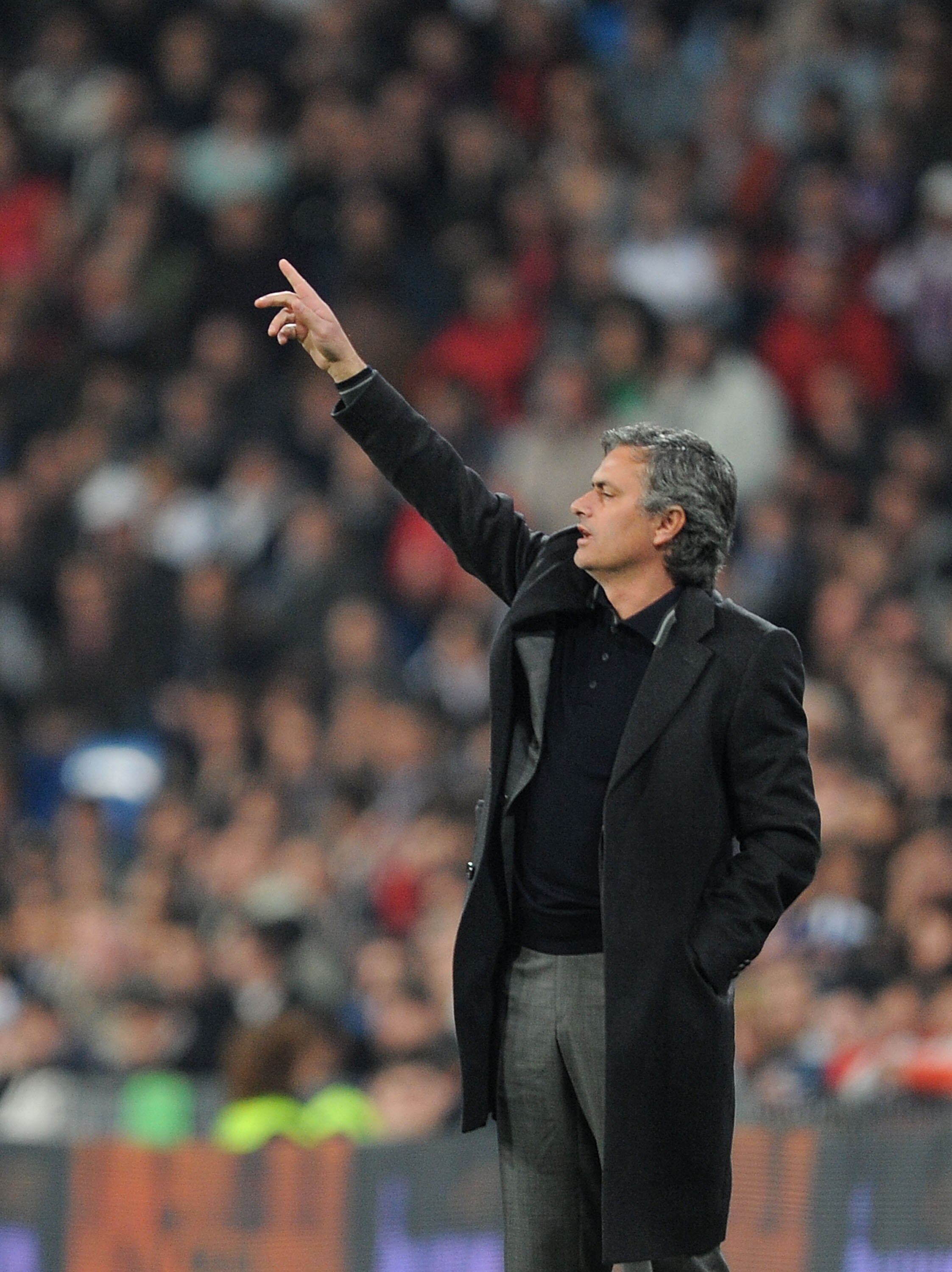 MADRID, SPAIN - FEBRUARY 06:  Head coach Jose Mourinho of Real Madrid manages his side during the La Liga match between Real Madrid and Real Sociedad at Estadio Santiago Bernabeu on February 6, 2011 in Madrid, Spain.  (Photo by Denis Doyle/Getty Images)