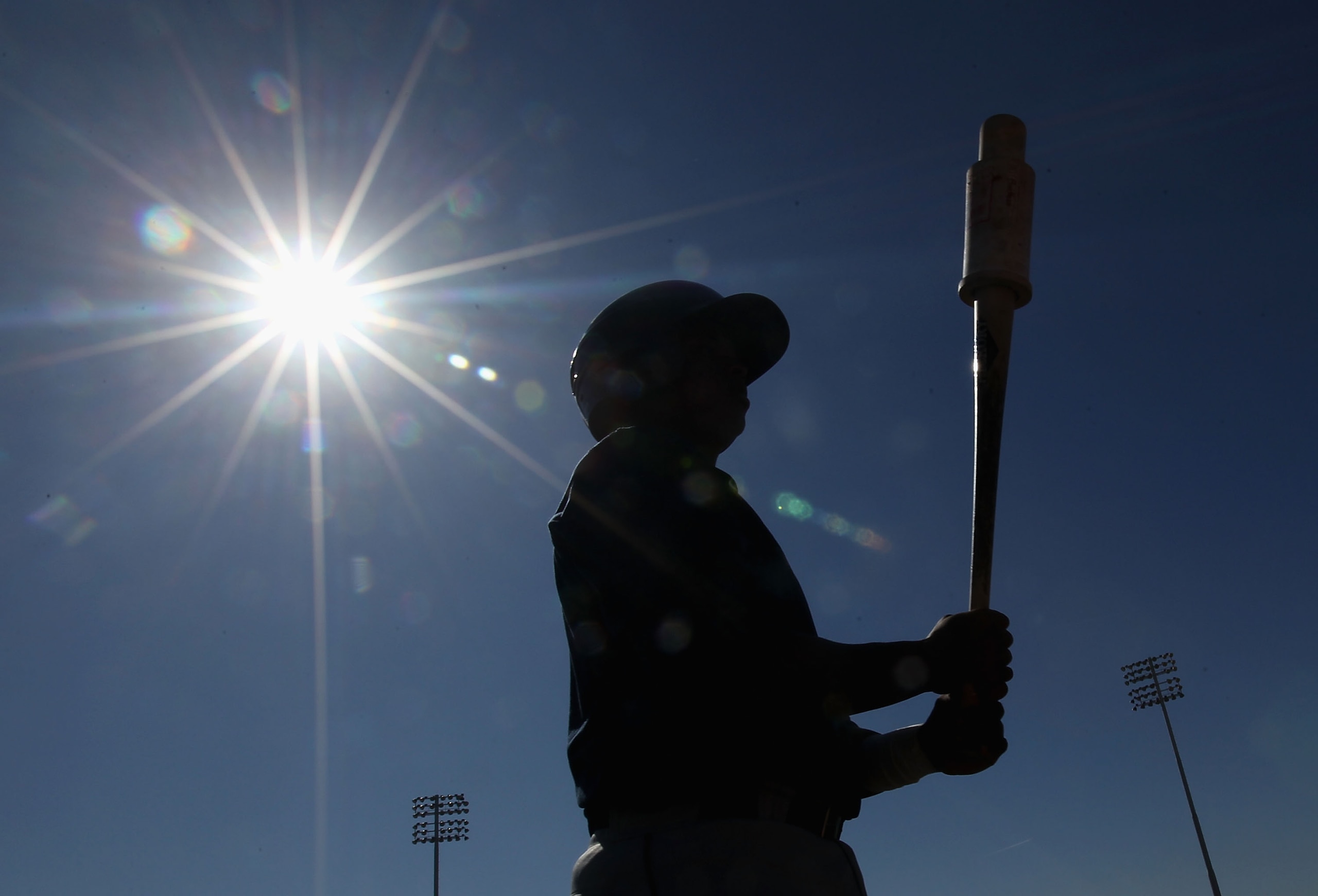 PEORIA, AZ - FEBRUARY 15:  A player from the Seattle Mariners takes batting practice during a MLB spring training practice at Peoria Stadium on February 15, 2011 in Peoria, Arizona.  (Photo by Christian Petersen/Getty Images)