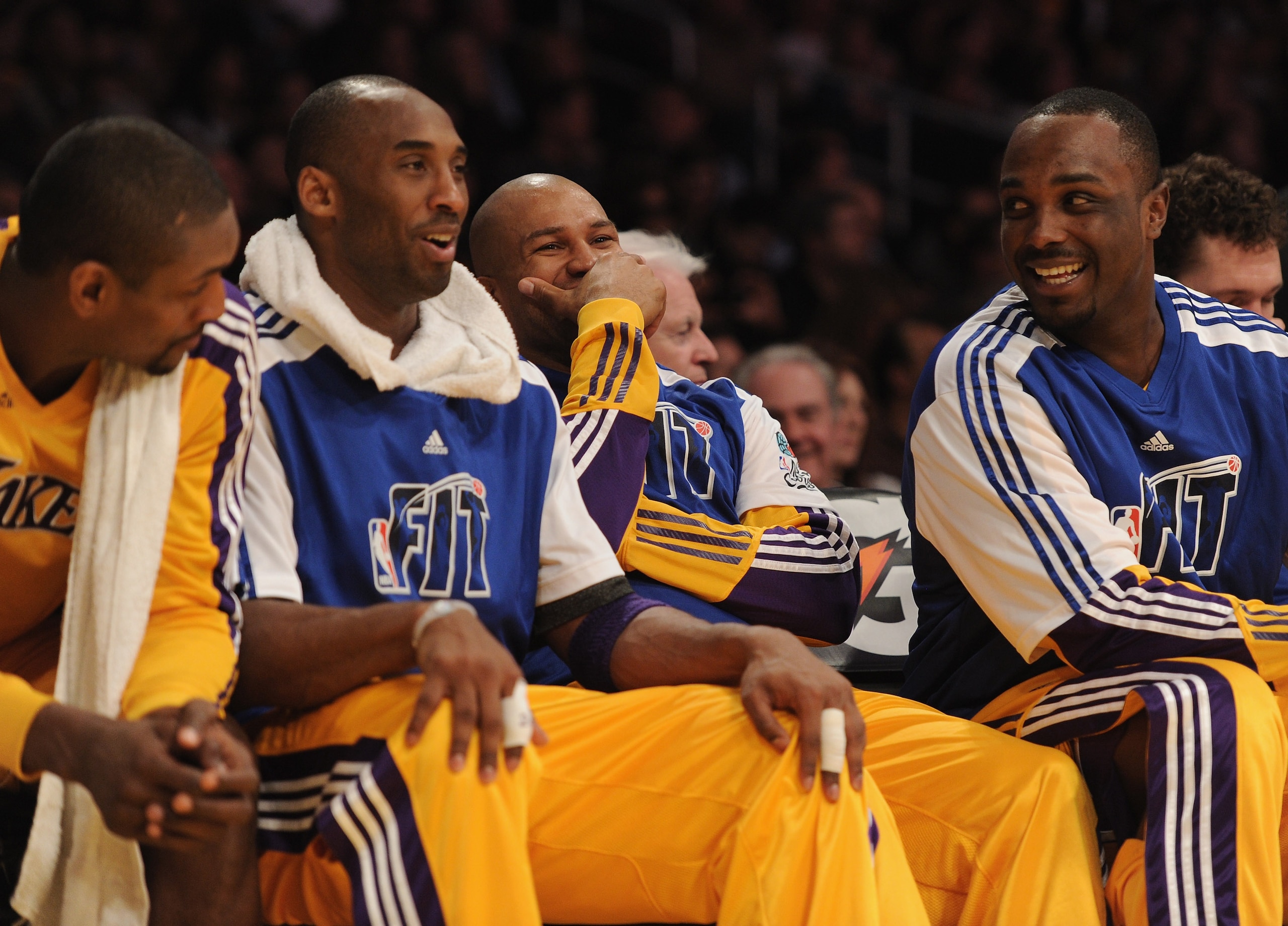 LOS ANGELES, CA - JANUARY 04: Derek Fisher #2 of the Los Angeles Lakers laughs with Kobe Bryant #24 and Derrick Caracter #45 during the game against the Detroit Pistons at the Staples Center on January 4, 2011 in Los Angeles, California. NOTE TO USER: Us LOS ANGELES, CA - JANUARY 04: Derek Fisher #2 of the Los Angeles Lakers laughs with Kobe Bryant #24 and Derrick Caracter #45 during the game against the Detroit Pistons at the Staples Center on January 4, 2011 in Los Angeles, California. NOTE TO USER: Us