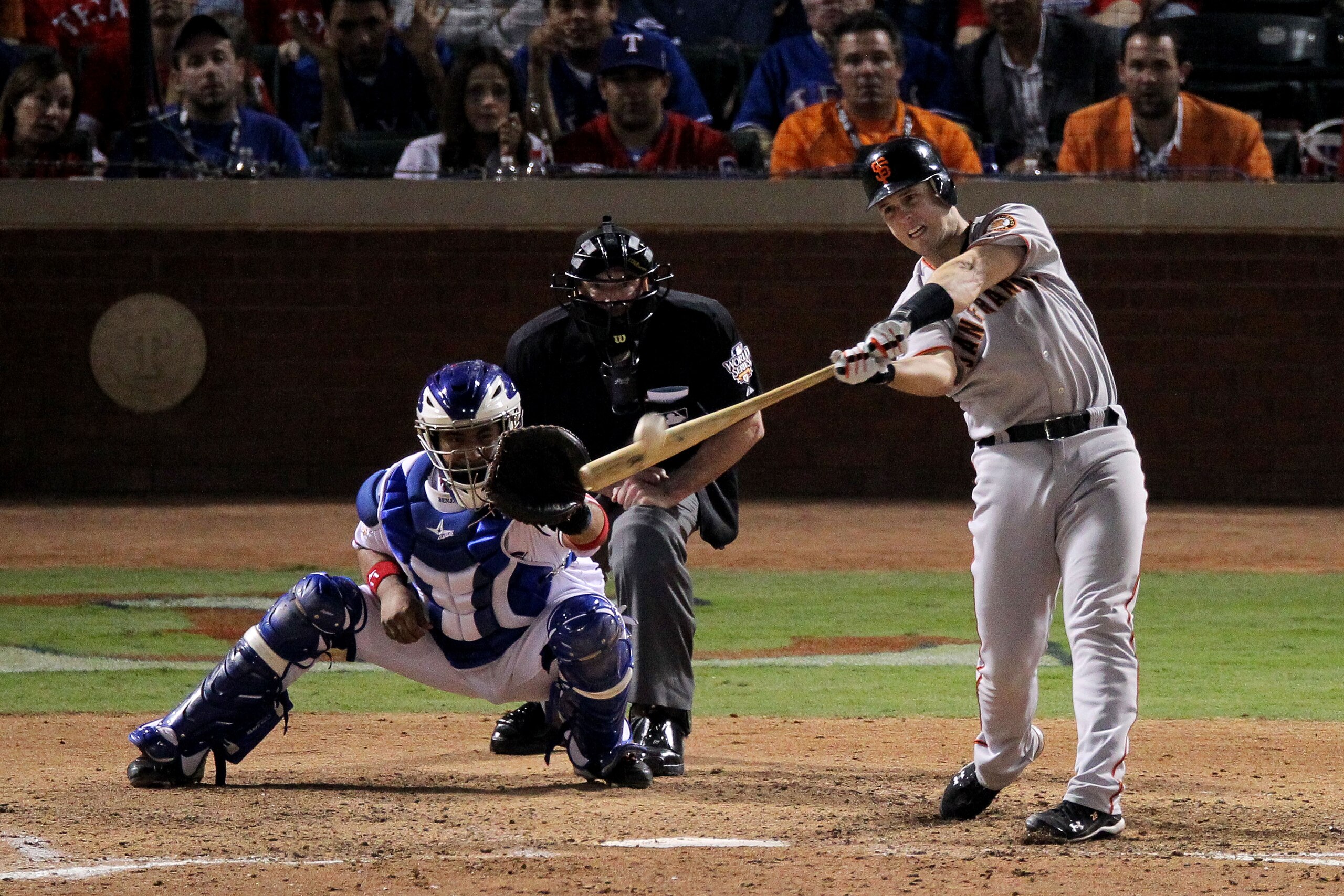 ARLINGTON, TX - OCTOBER 31:  Buster Posey #28 of the San Francisco Giants hits a home run against the Texas Rangers during the top of the eighth inning in Game Four of the 2010 MLB World Series at Rangers Ballpark in Arlington on October 31, 2010 in Arlin