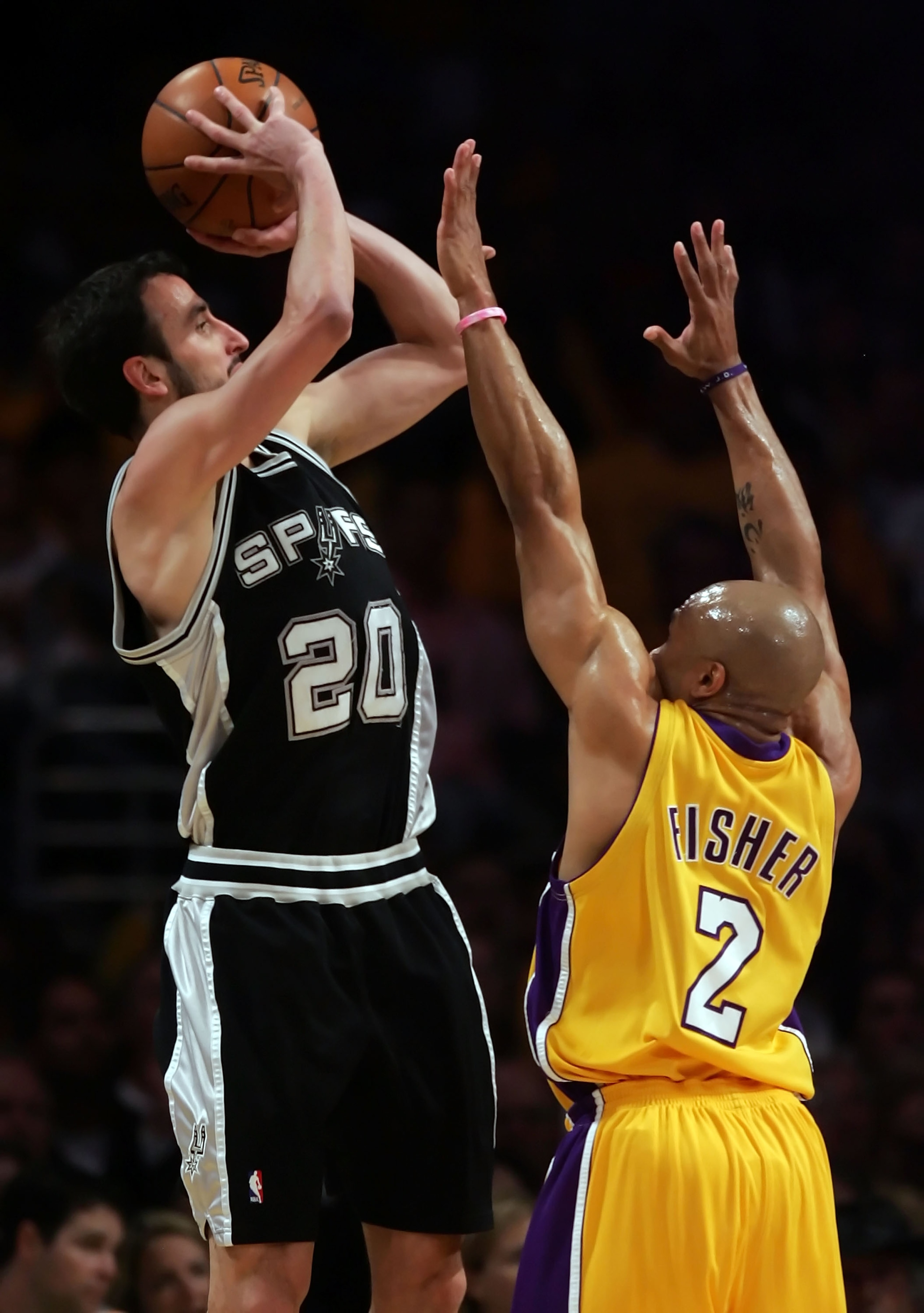LOS ANGELES, CA - MAY 29:  Manu Ginobili #20 of the San Antonio Spurs shoots over Derek Fisher #2 of the Los Angeles Lakers in Game Five of the Western Conference Finals during the 2008 NBA Playoffs on May 29, 2008 at Staples Center in Los Angeles, Califo