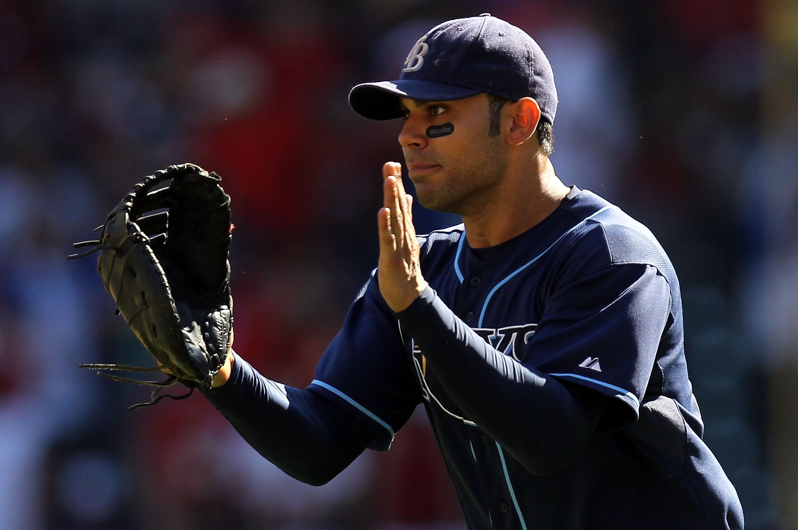 ARLINGTON, TX - OCTOBER 10:  Carlos Pena #23 of the Tampa Bay Rays celebrates after a 5-2 win against the Texas Rangers during game 4 of the ALDS at Rangers Ballpark in Arlington on October 10, 2010 in Arlington, Texas.  (Photo by Ronald Martinez/Getty Im