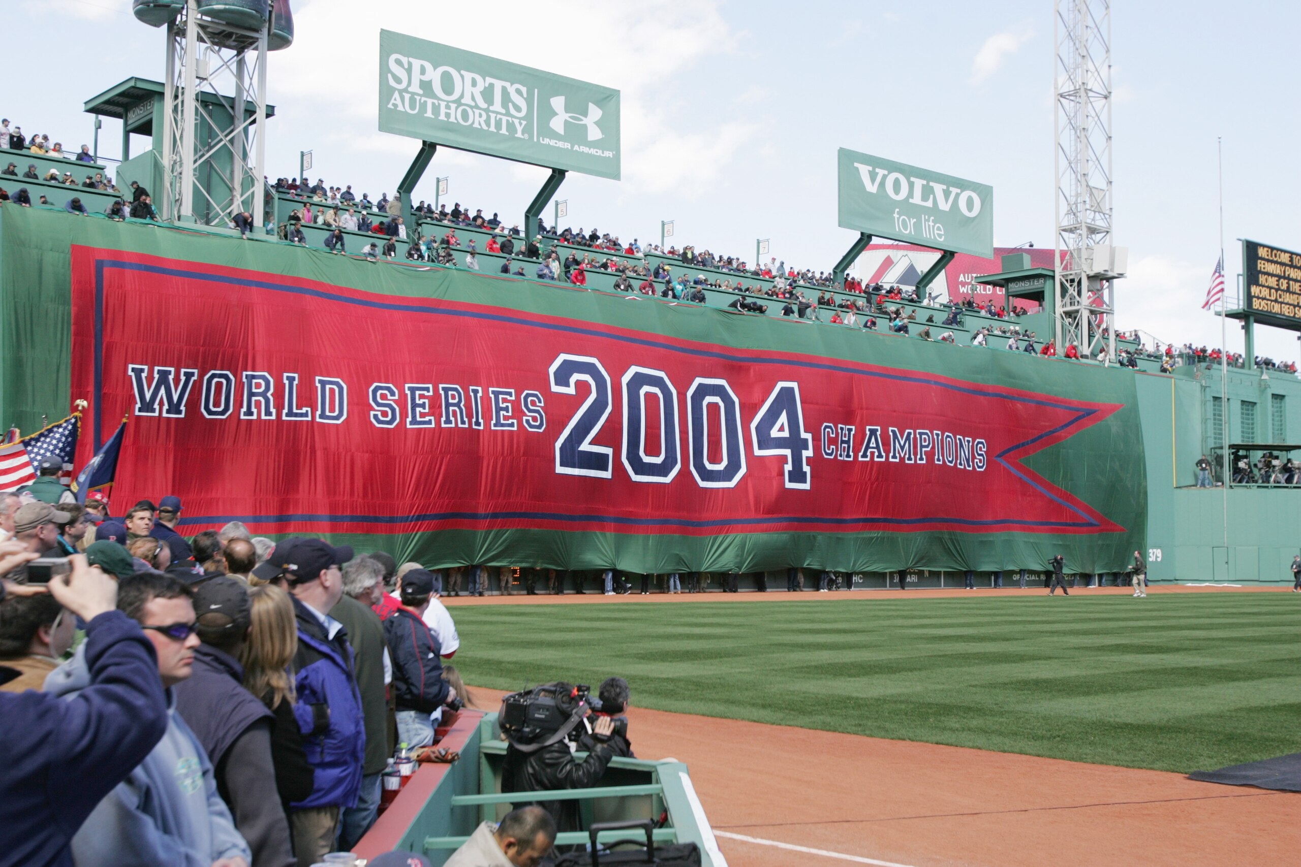 BOSTON - APRIL 11:  The Boston Red Sox display a 2004 World Series Championship banner during the pregame ceremony celebrating the Red Sox win in the World Series. The ceremony was held prior to the game against the New York Yankees at Fenway Park on Apri