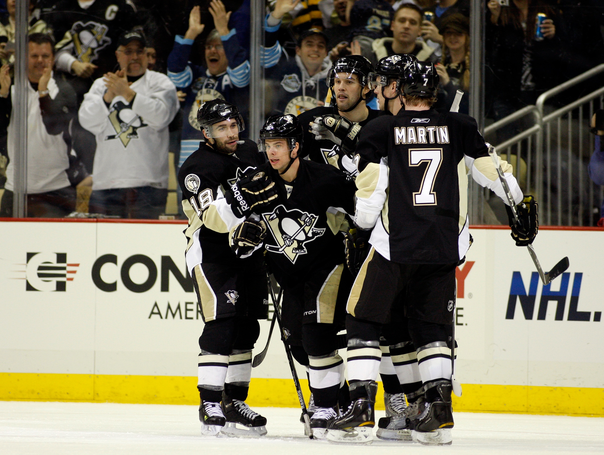 PITTSBURGH, PA - FEBRUARY 02:  Tyler Kennedy #48 of the Pittsburgh Penguins celebrates his goal with teammates against the New York Islanders at Consol Energy Center on February 2, 2011 in Pittsburgh, Pennsylvania.  (Photo by Justin K. Aller/Getty Images)