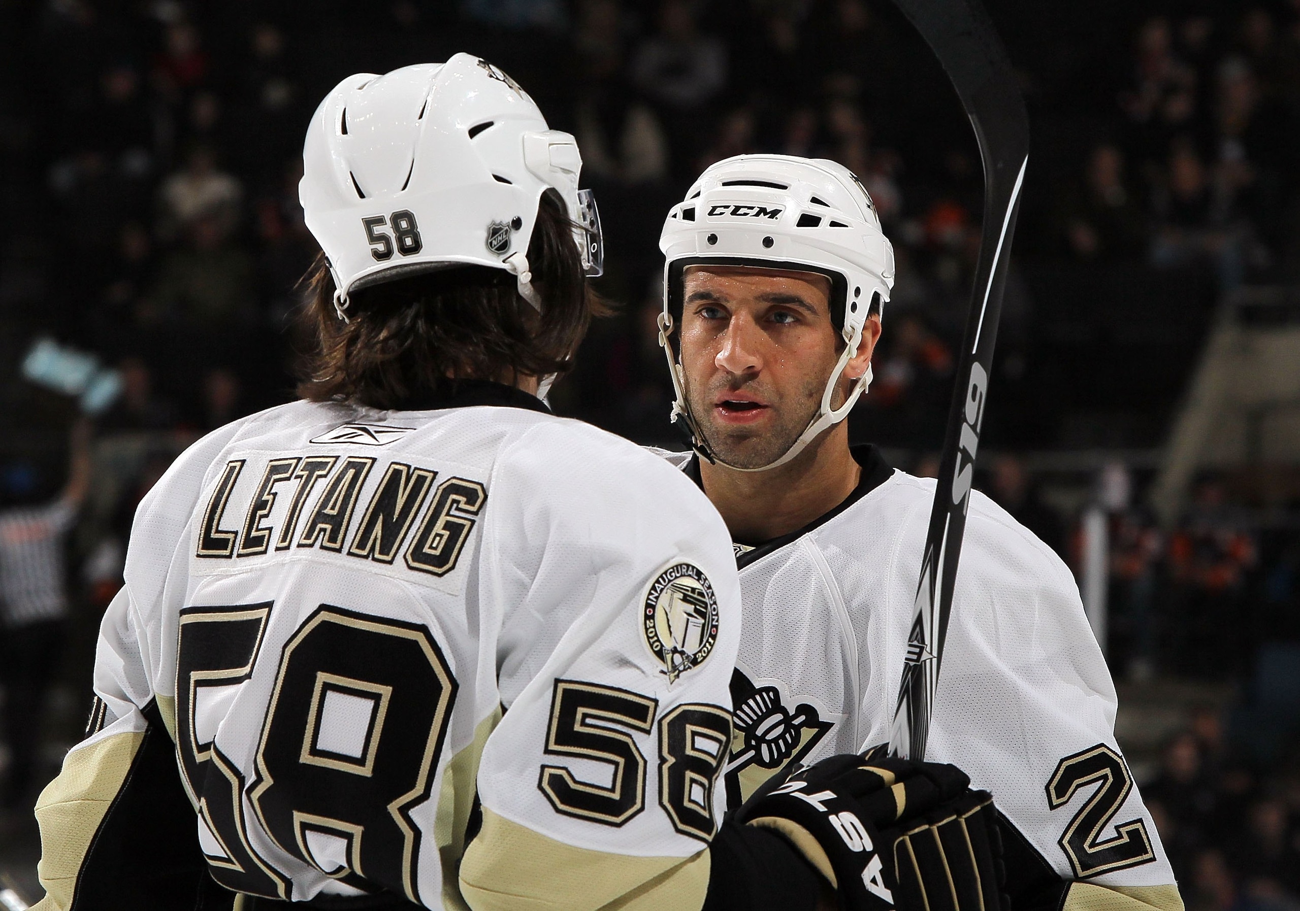 UNIONDALE, NY - FEBRUARY 11:  Maxime Talbot #25 and Kris Letang #58 of the Pittsburgh Penguins skate against the New York Islanders on February 11, 2011 at Nassau Coliseum in Uniondale, New York. The Isles defeated the Pens 9-3.  (Photo by Jim McIsaac/Get