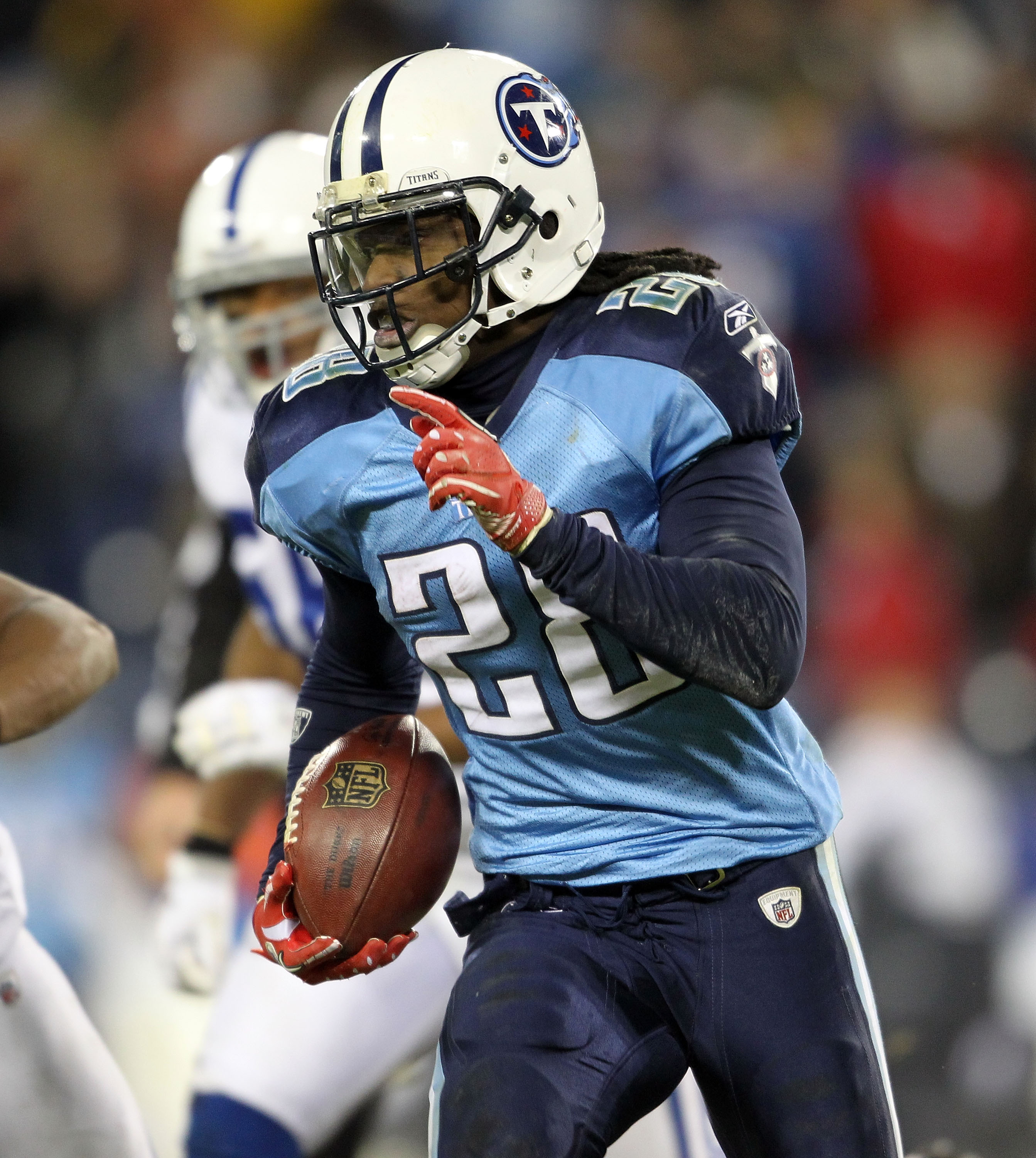 Tennessee Titans running-back Chris Johnson (28) carries the ball