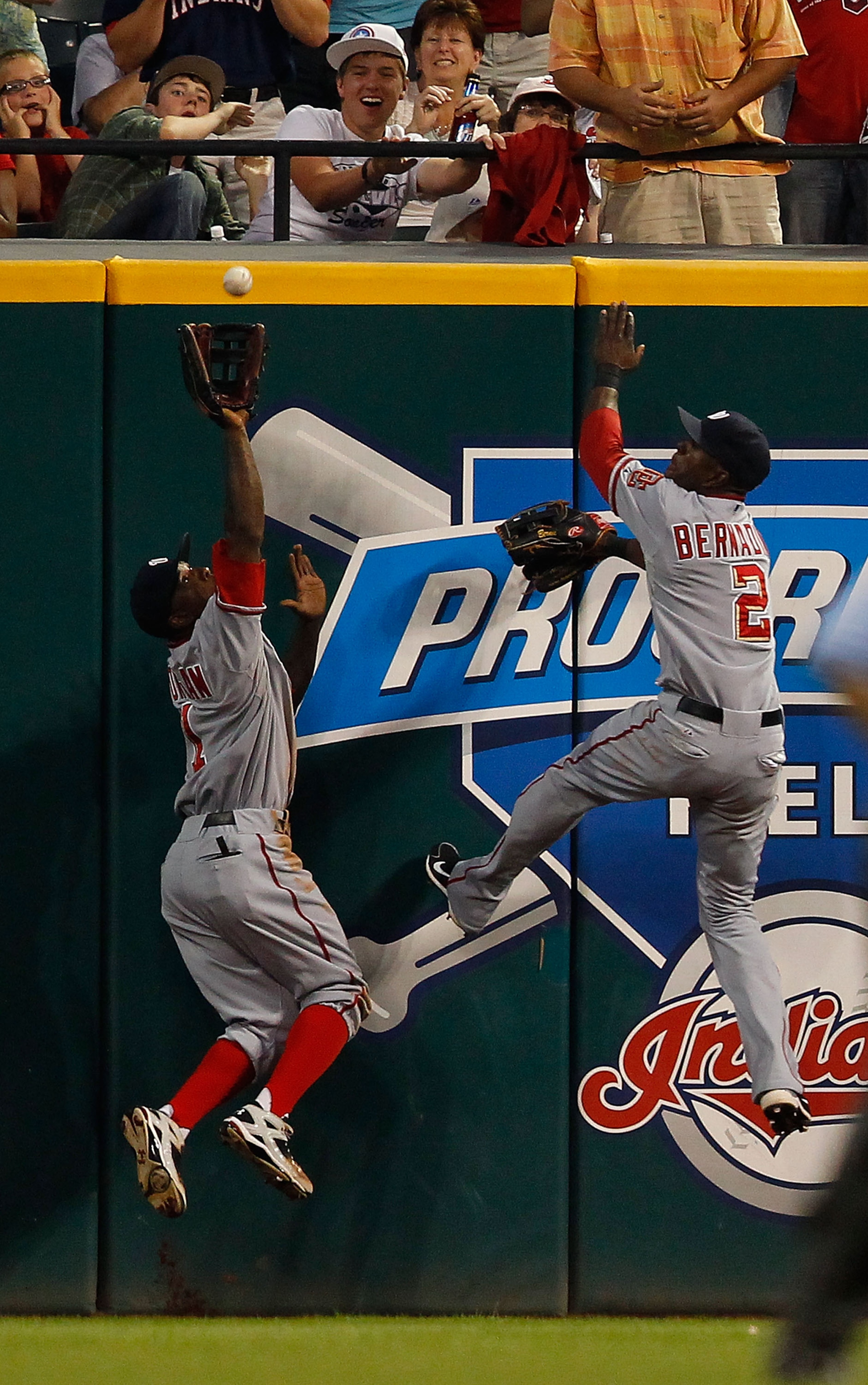 CLEVELAND - JUNE 11:  Nyjer Morgan #1 and Roger Bernadina #2 of the Washington Nationals both go up for a ball during the game against the Cleveland Indians on June 11, 2010 at Progressive Field in Cleveland, Ohio.  (Photo by Jared Wickerham/Getty Images)